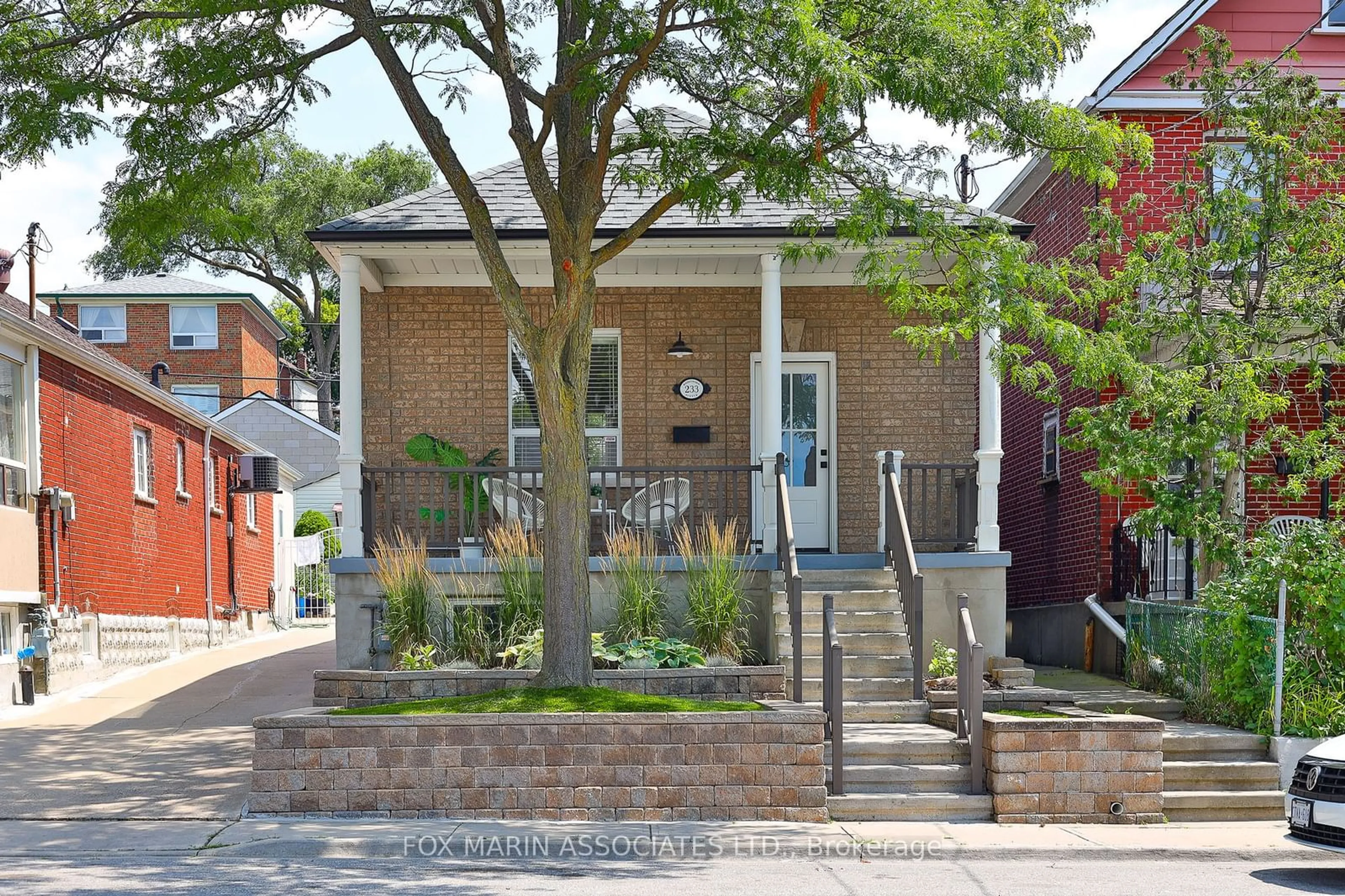 Home with brick exterior material for 233 Rosethorn Ave, Toronto Ontario M6M 3K9