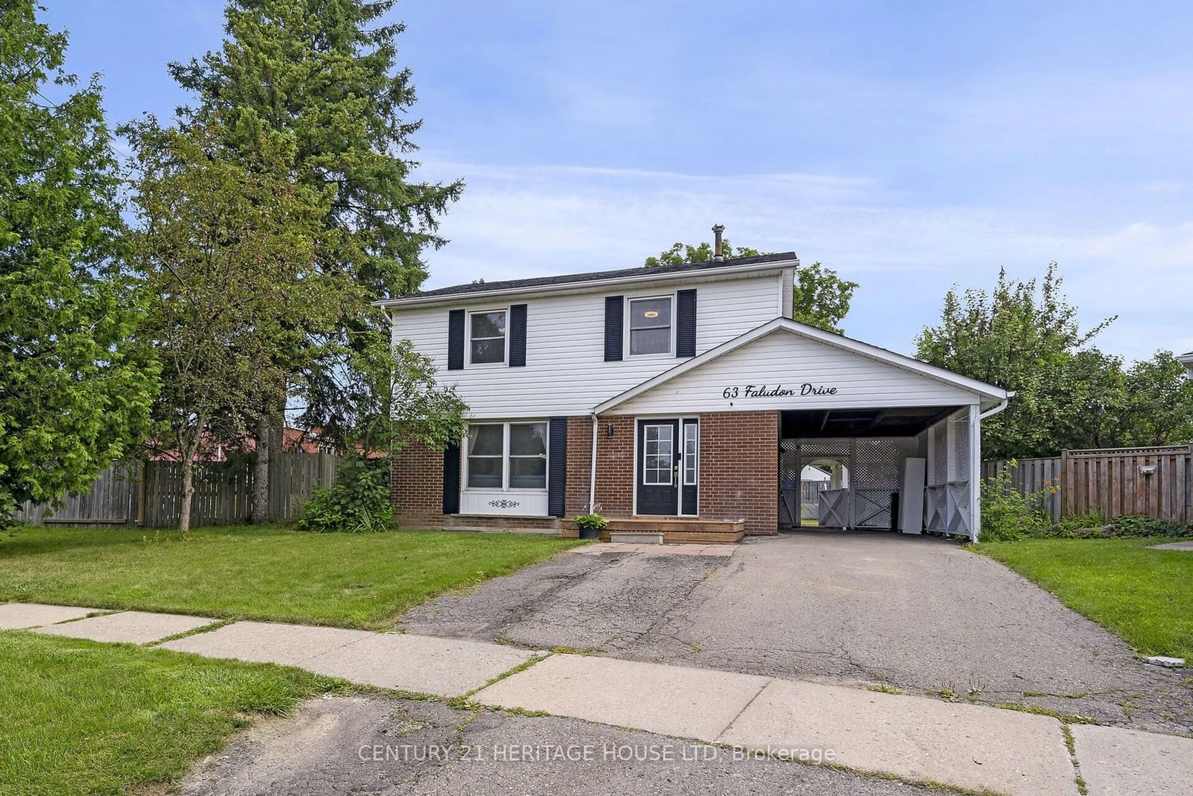 Frontside or backside of a home for 63 Faludon Dr, Halton Hills Ontario L7G 1H9