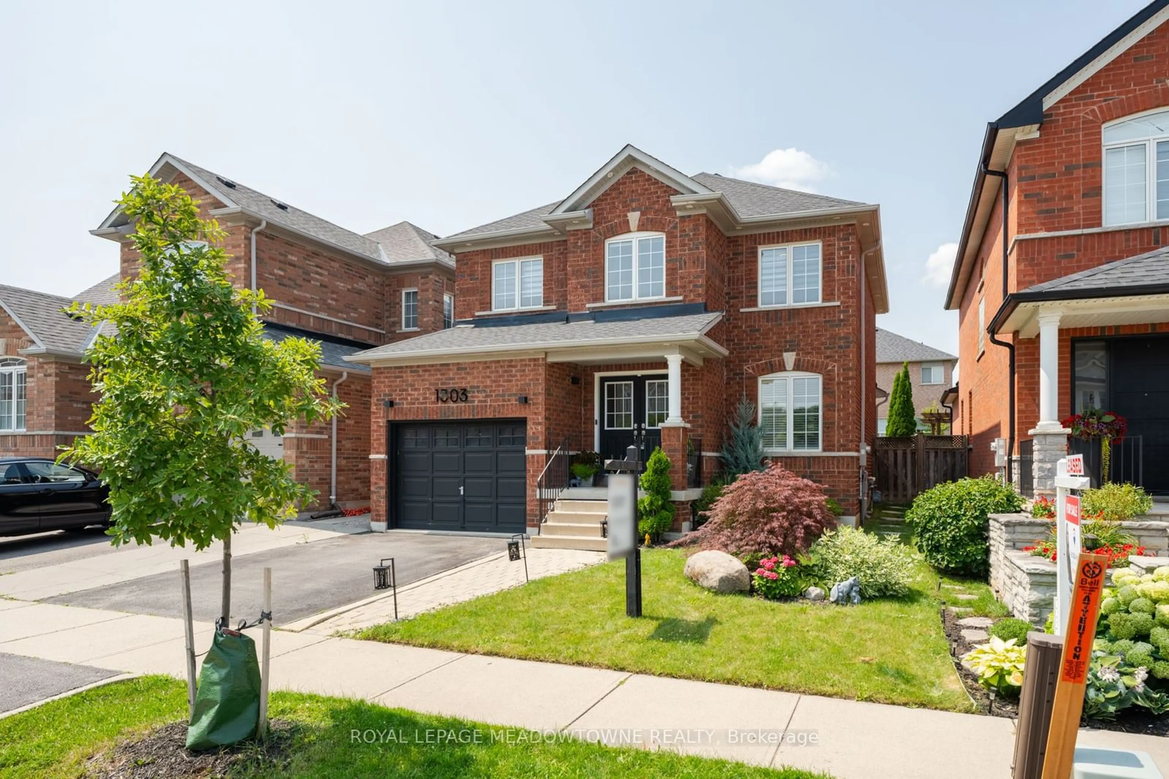 Home with brick exterior material for 1303 Weller Crossing, Milton Ontario L9T 6K4