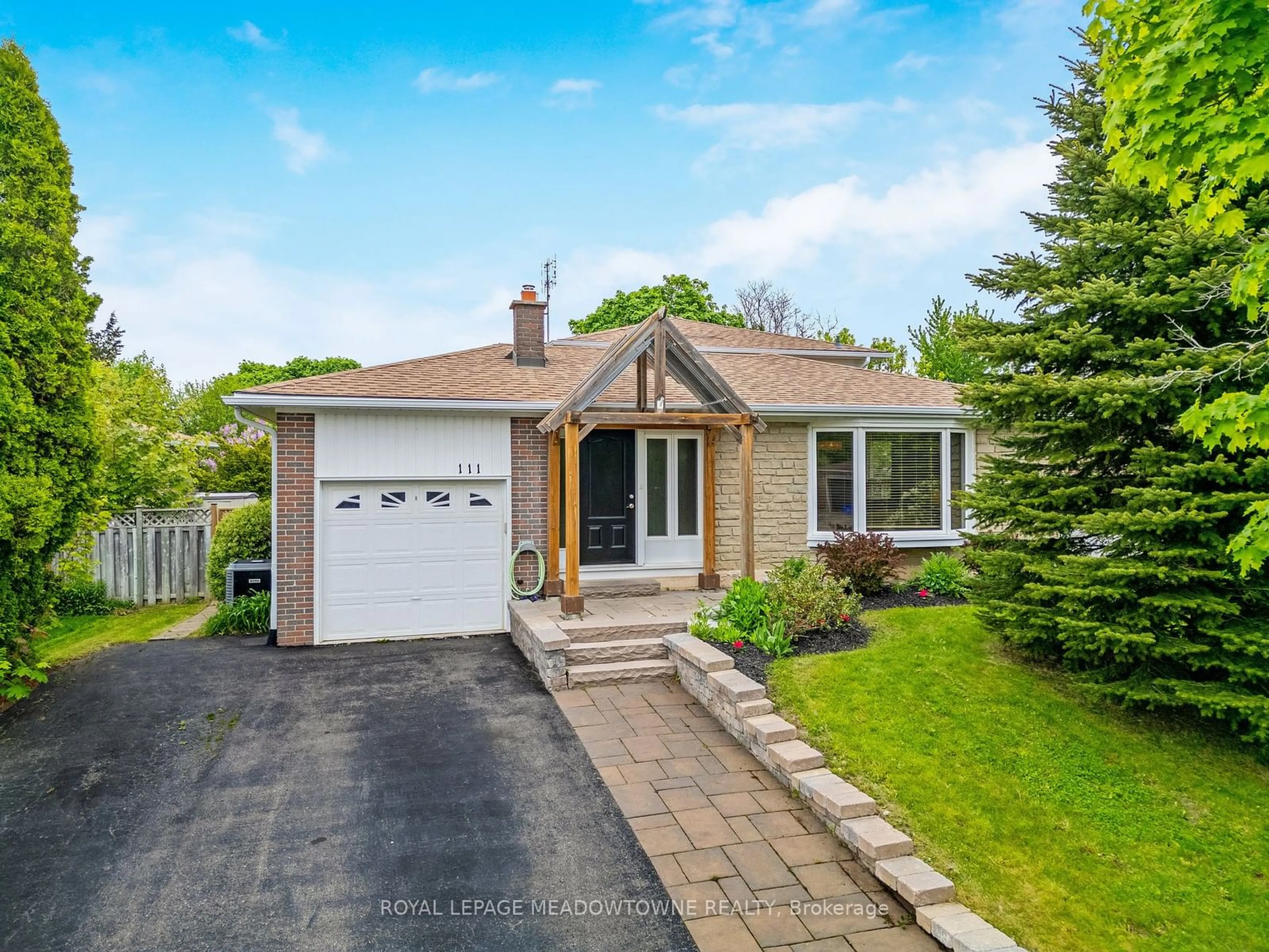 Frontside or backside of a home for 111 Rexway Dr, Halton Hills Ontario L7G 1R3