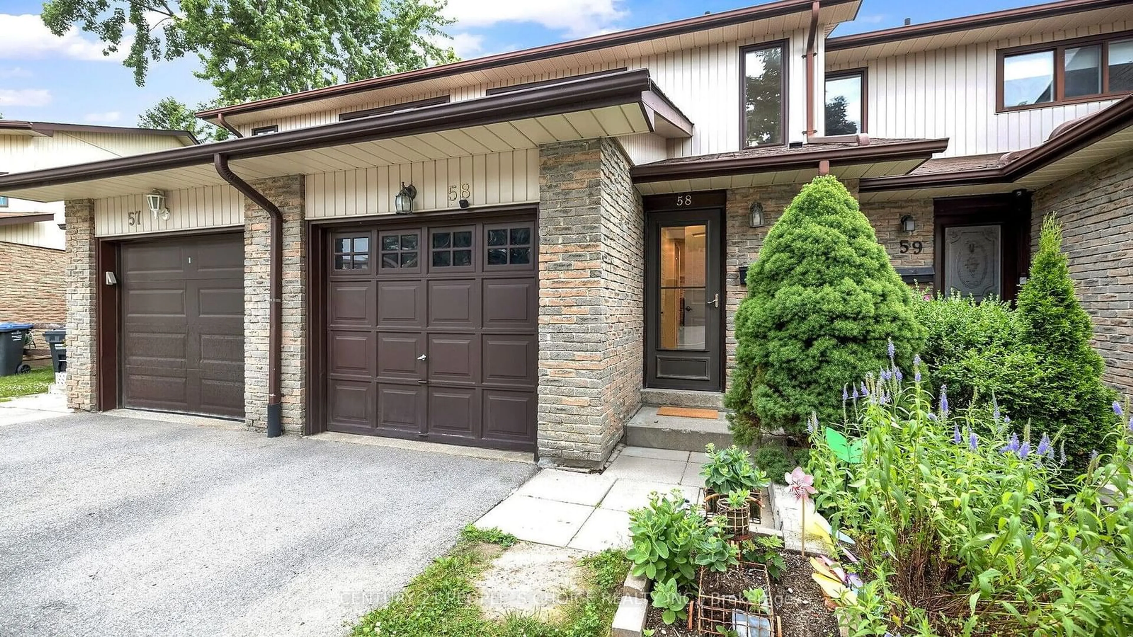 Home with brick exterior material for 58 Dawson Cres, Brampton Ontario L6V 3M5