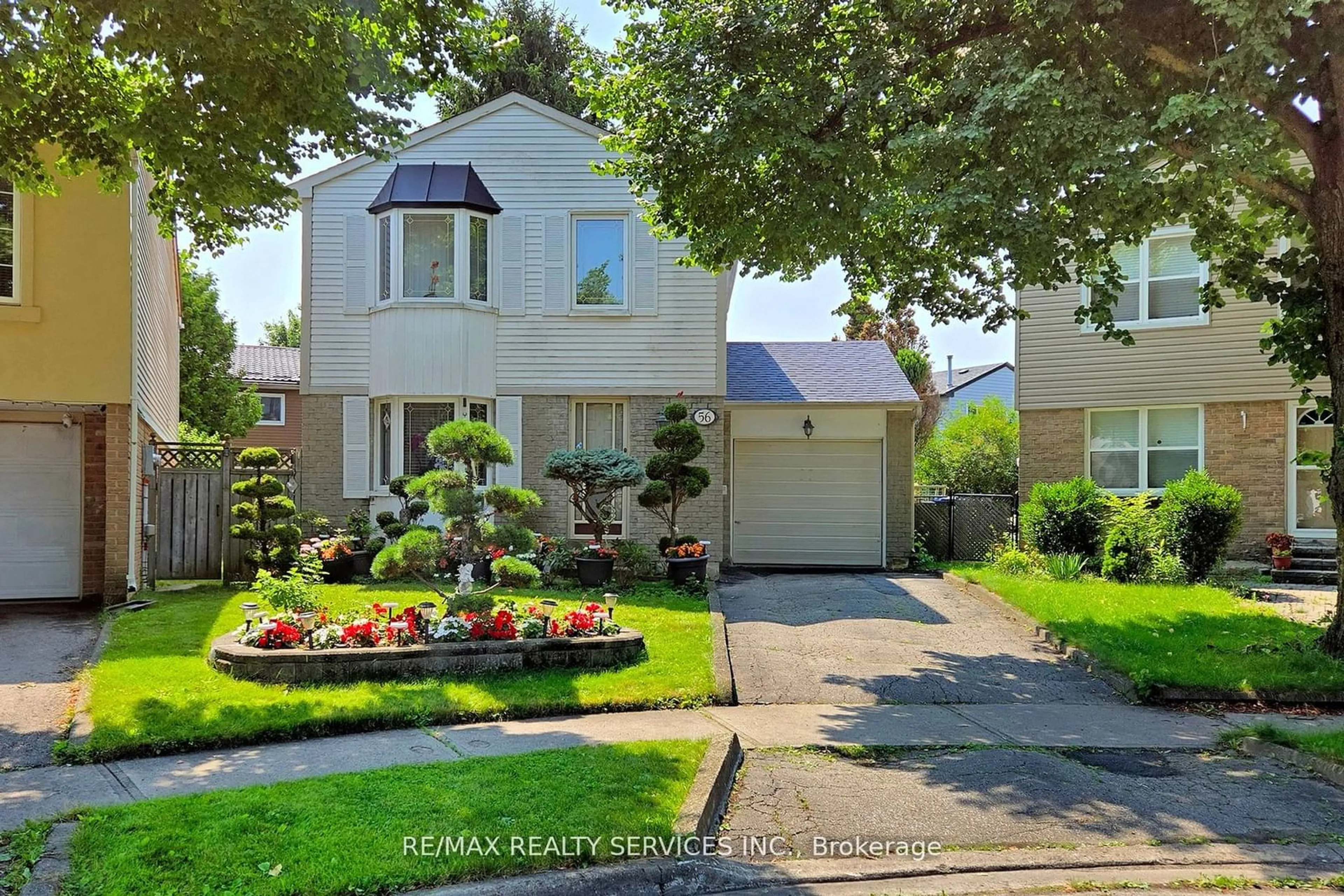 Frontside or backside of a home for 56 Majestic Cres, Brampton Ontario L6S 3N2