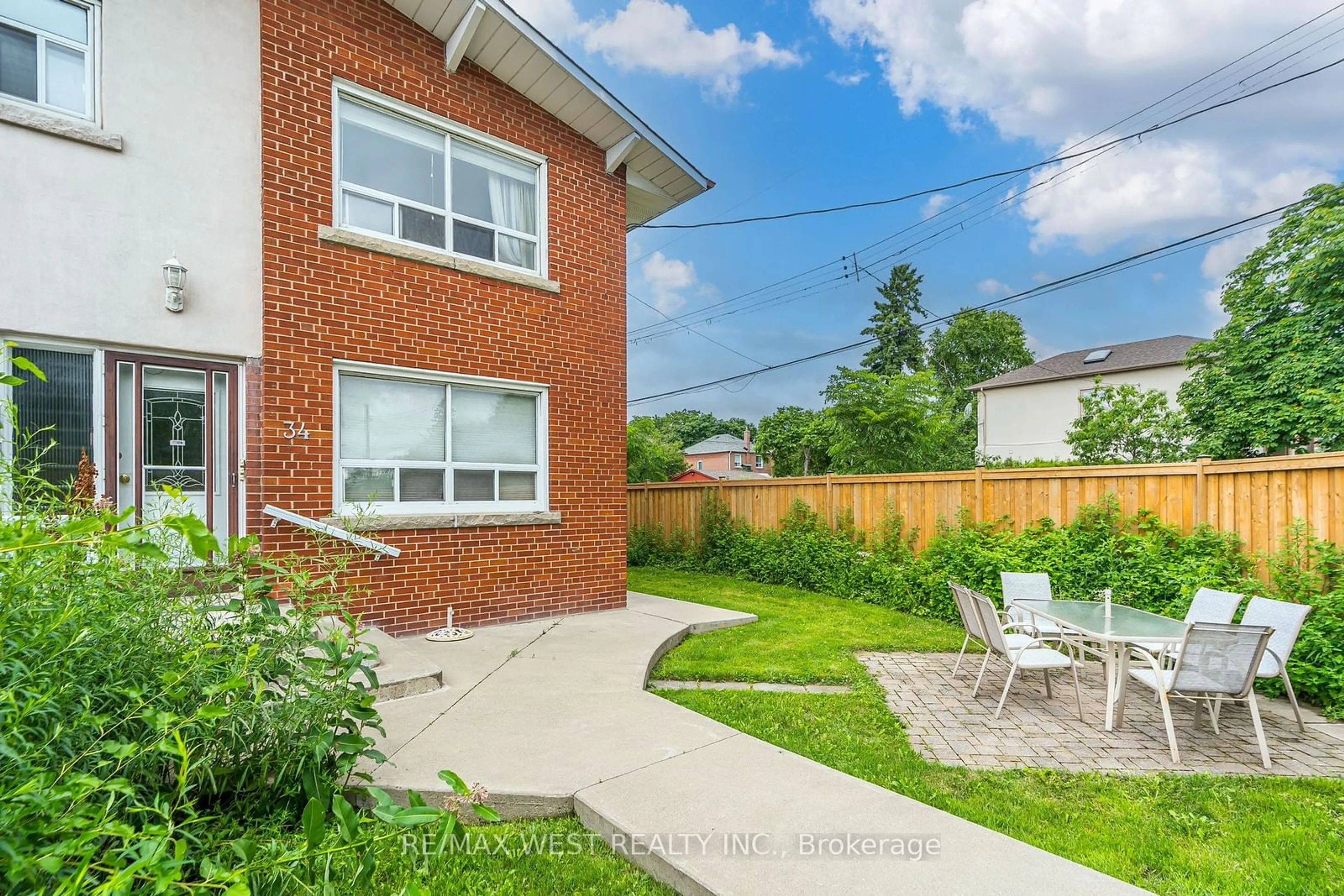 Frontside or backside of a home for 34 Penhurst Ave, Toronto Ontario M8Y 3A9