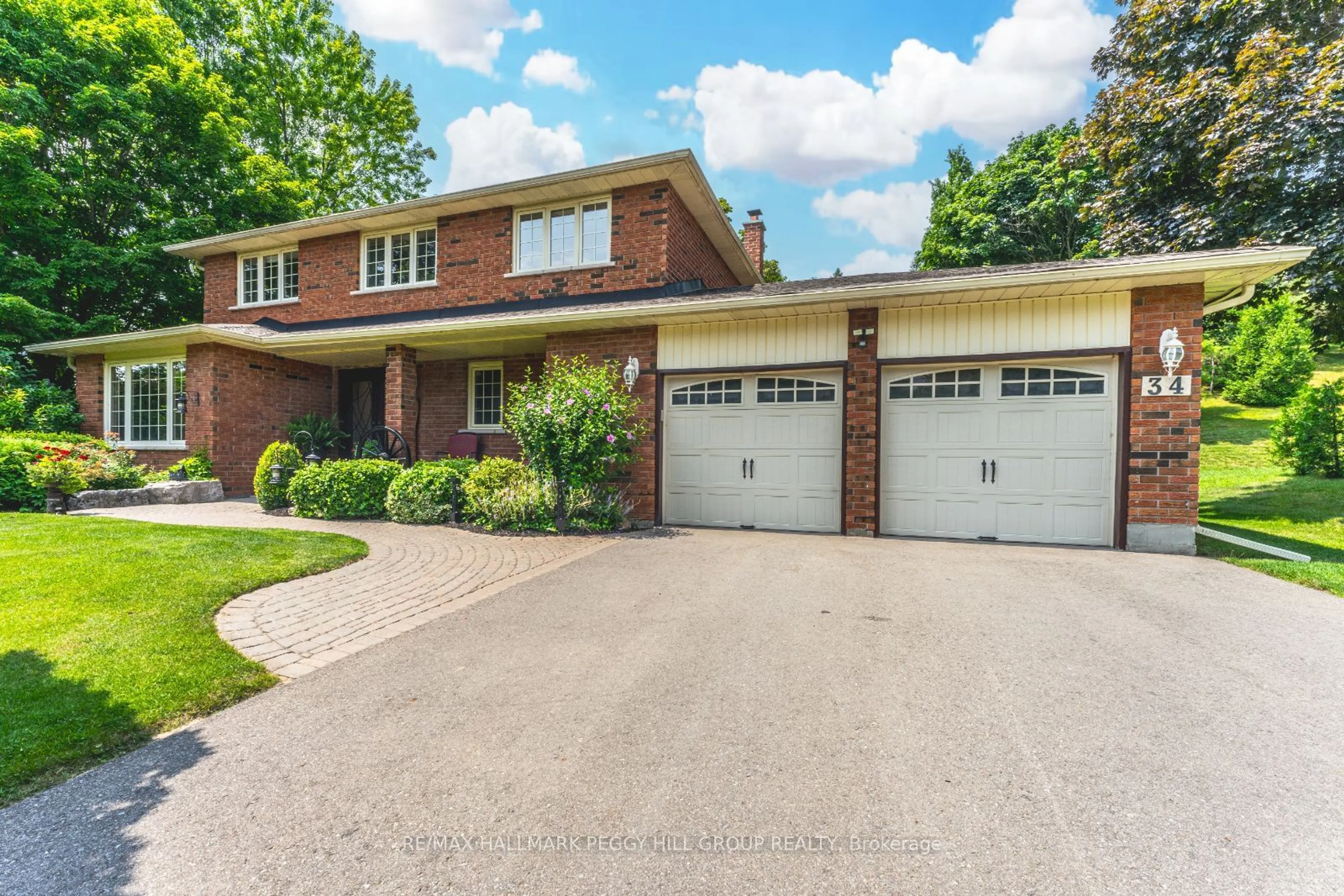 Home with brick exterior material for 34 Marilyn St, Caledon Ontario L7C 1H5