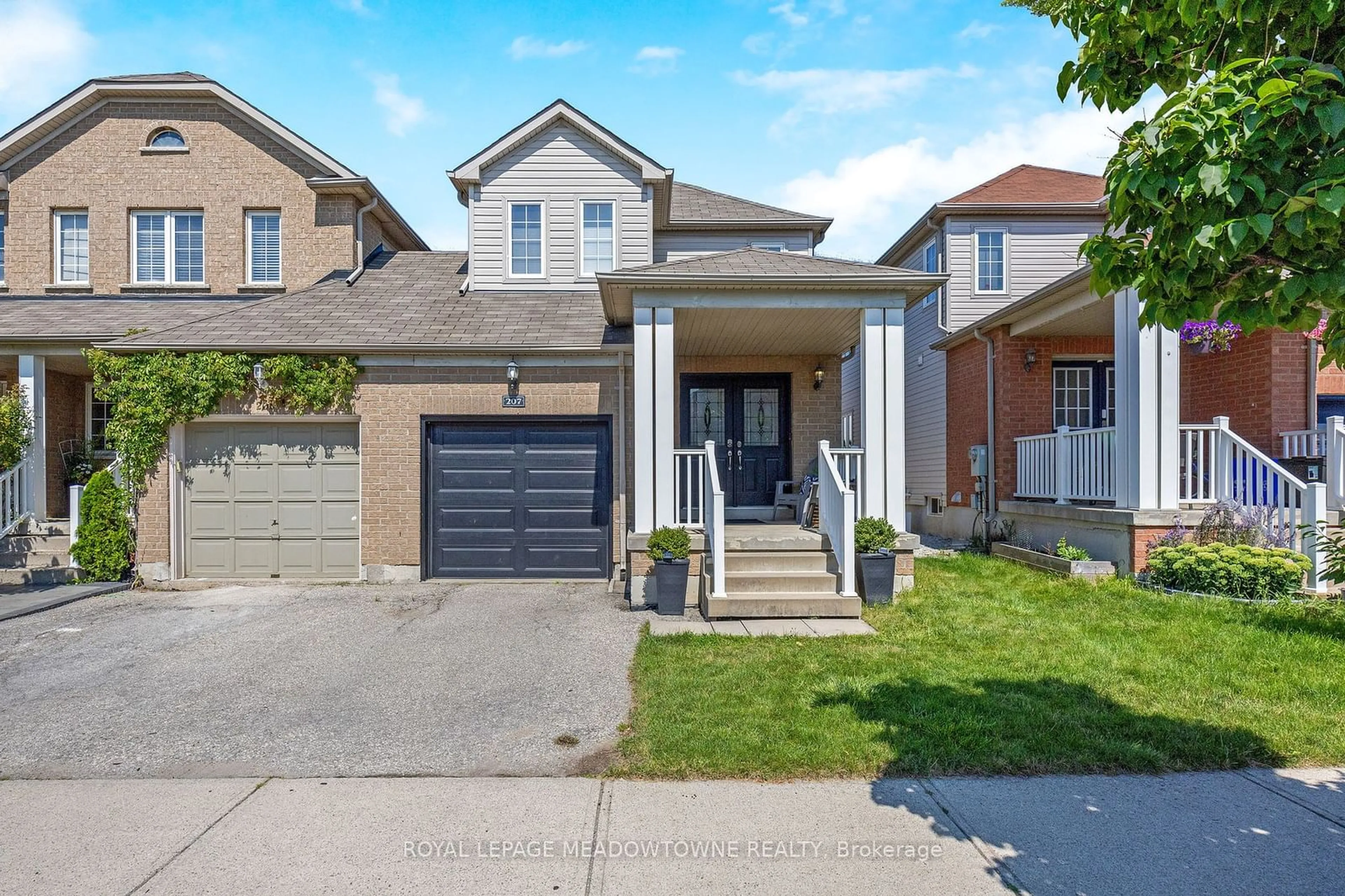 Frontside or backside of a home for 207 Sherwood Rd, Milton Ontario L9T 7C1