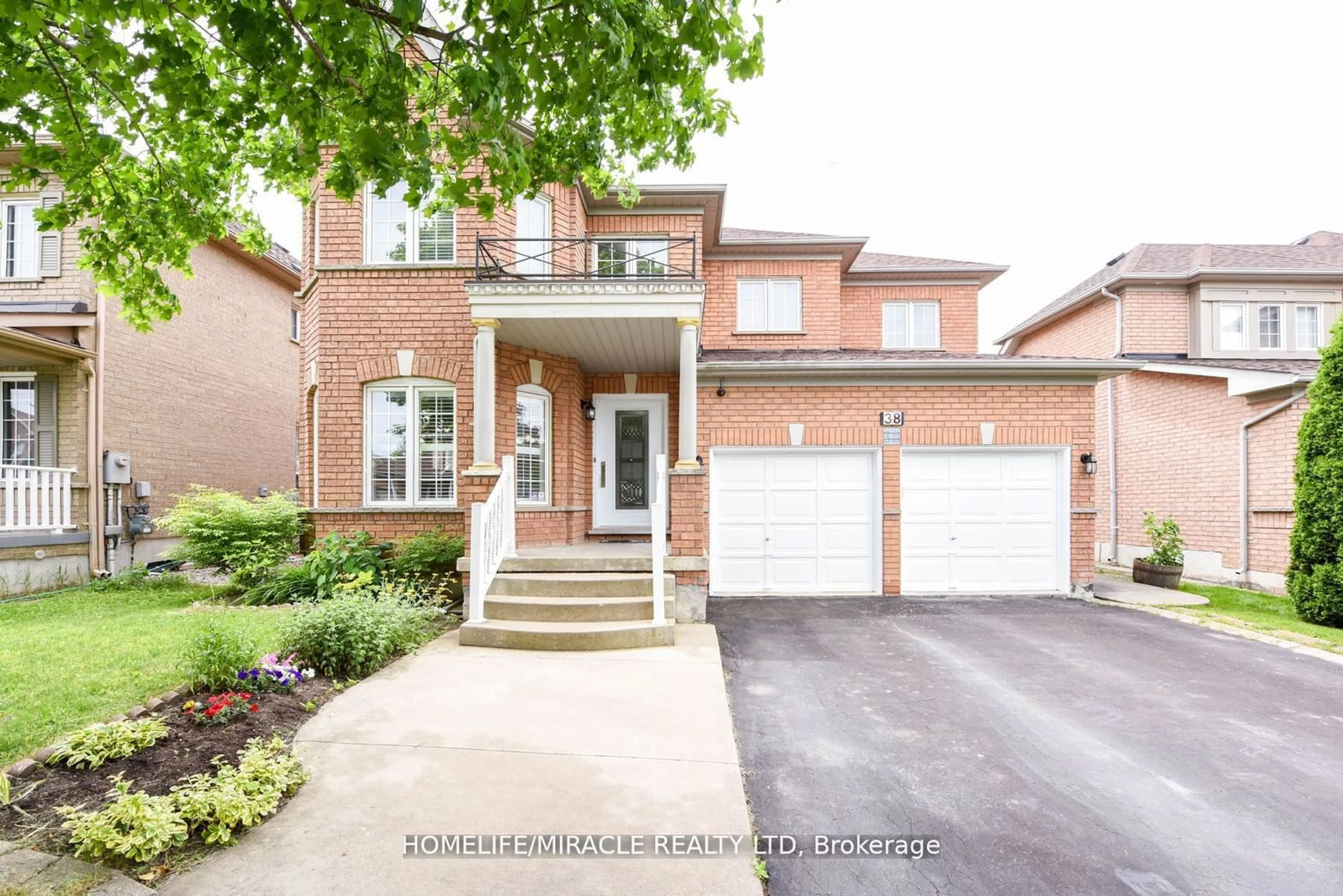 Home with brick exterior material for 38 Mint Leaf Blvd, Brampton Ontario L6R 2K4