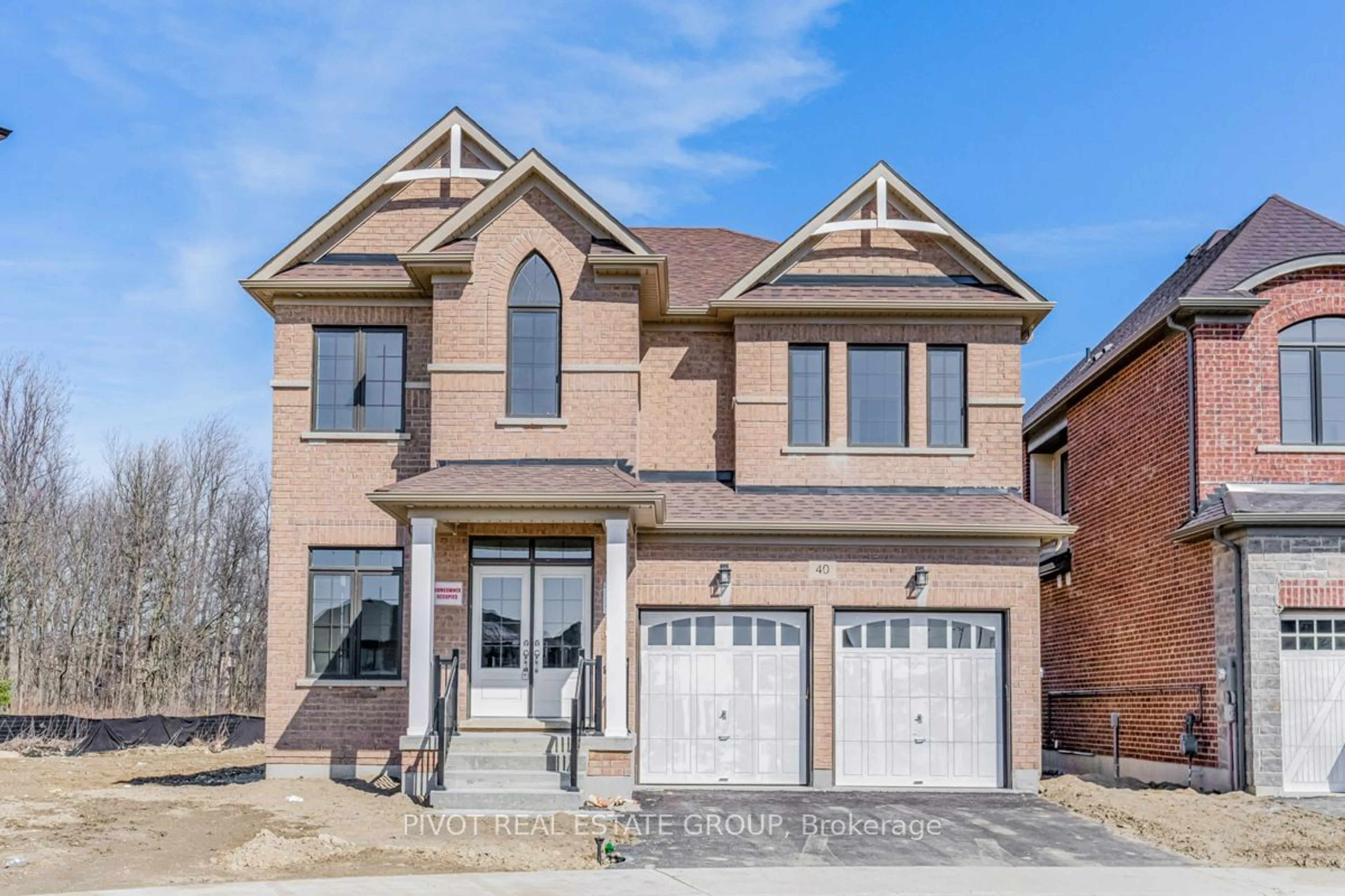 Home with brick exterior material for 40 Dundee St, Caledon Ontario L7C 4K2