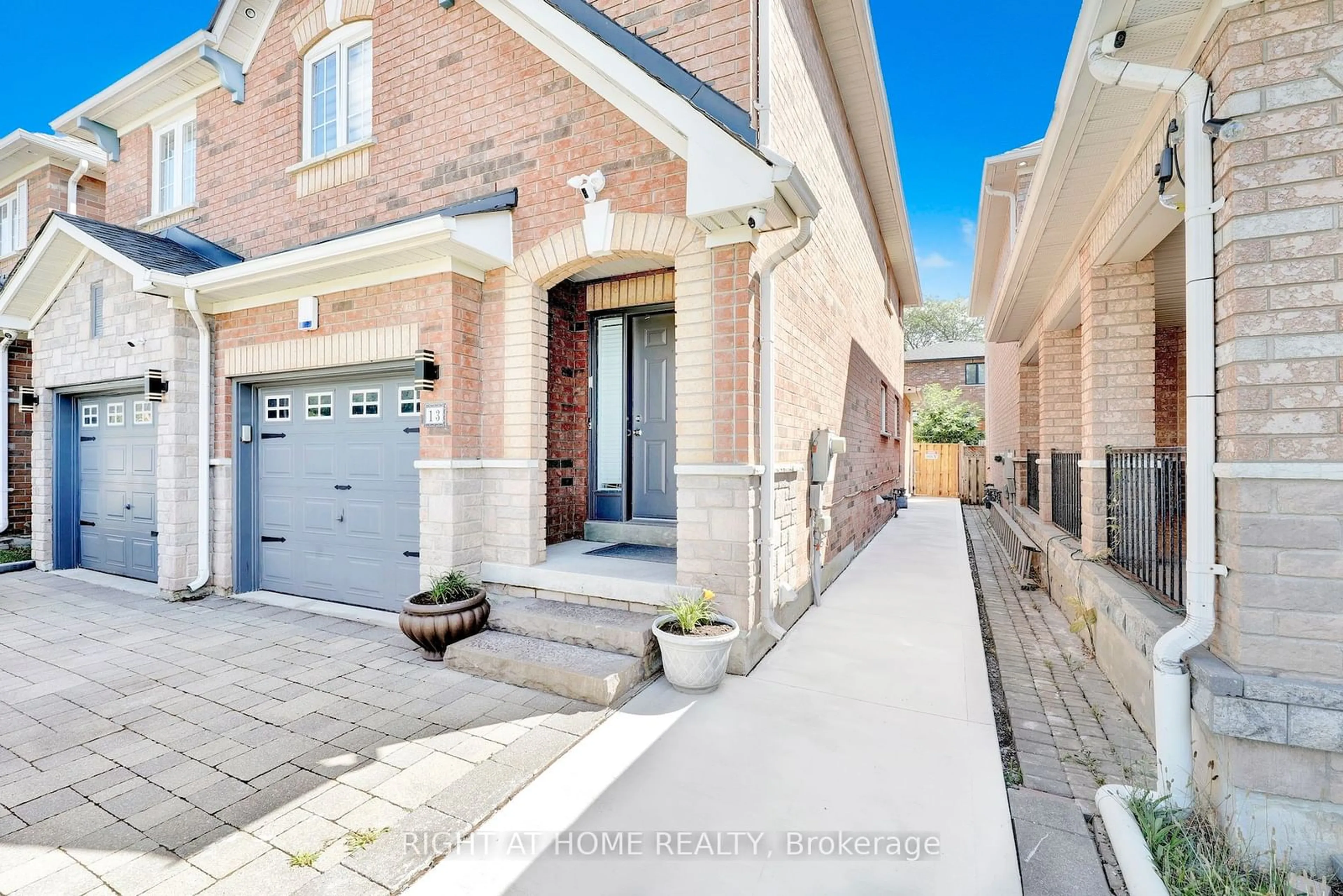 Home with brick exterior material for 13 Meadow Oak Pl, Toronto Ontario M9N 3Z4