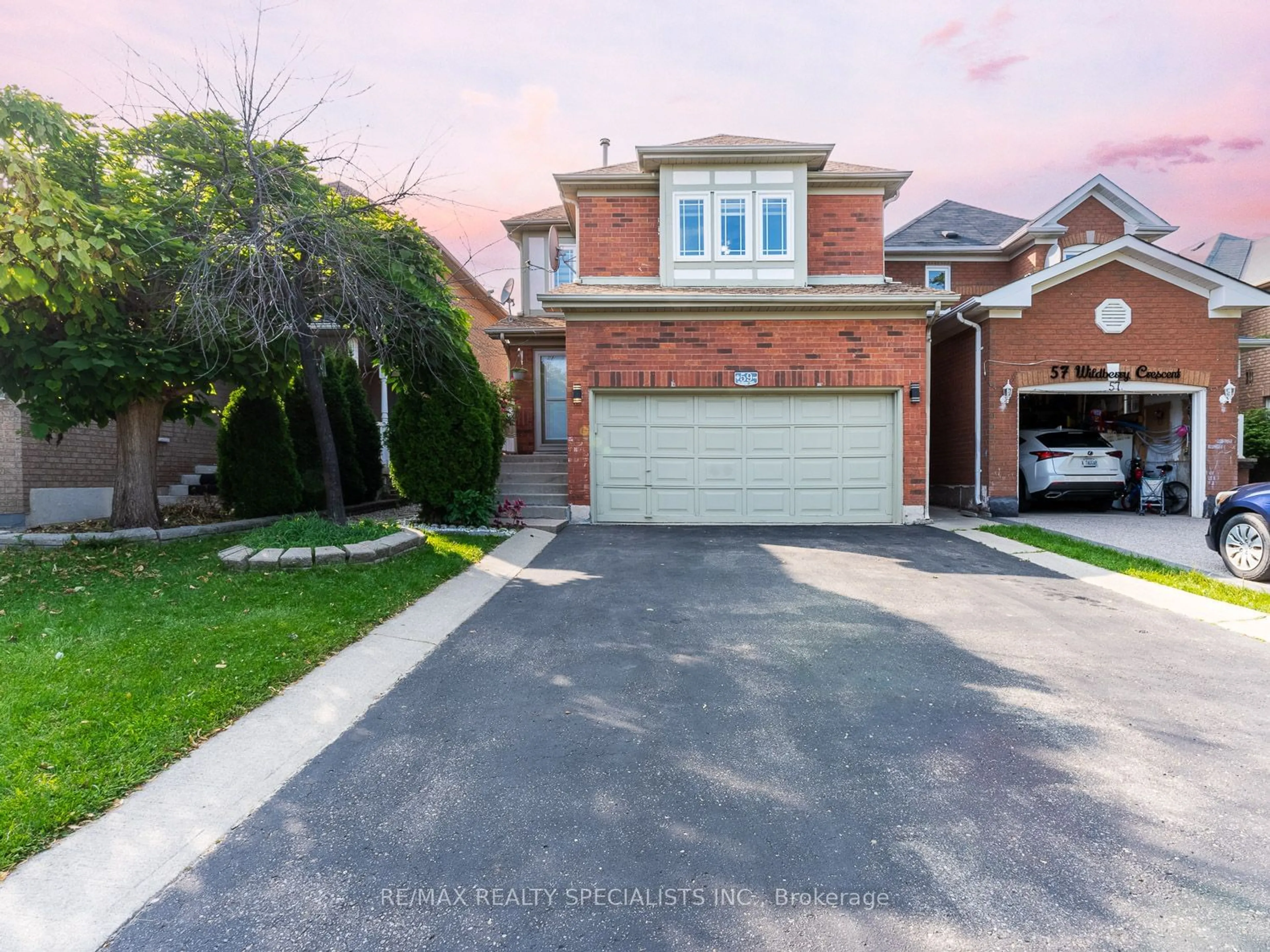 Frontside or backside of a home for 59 Wildberry Cres, Brampton Ontario L6R 1J9
