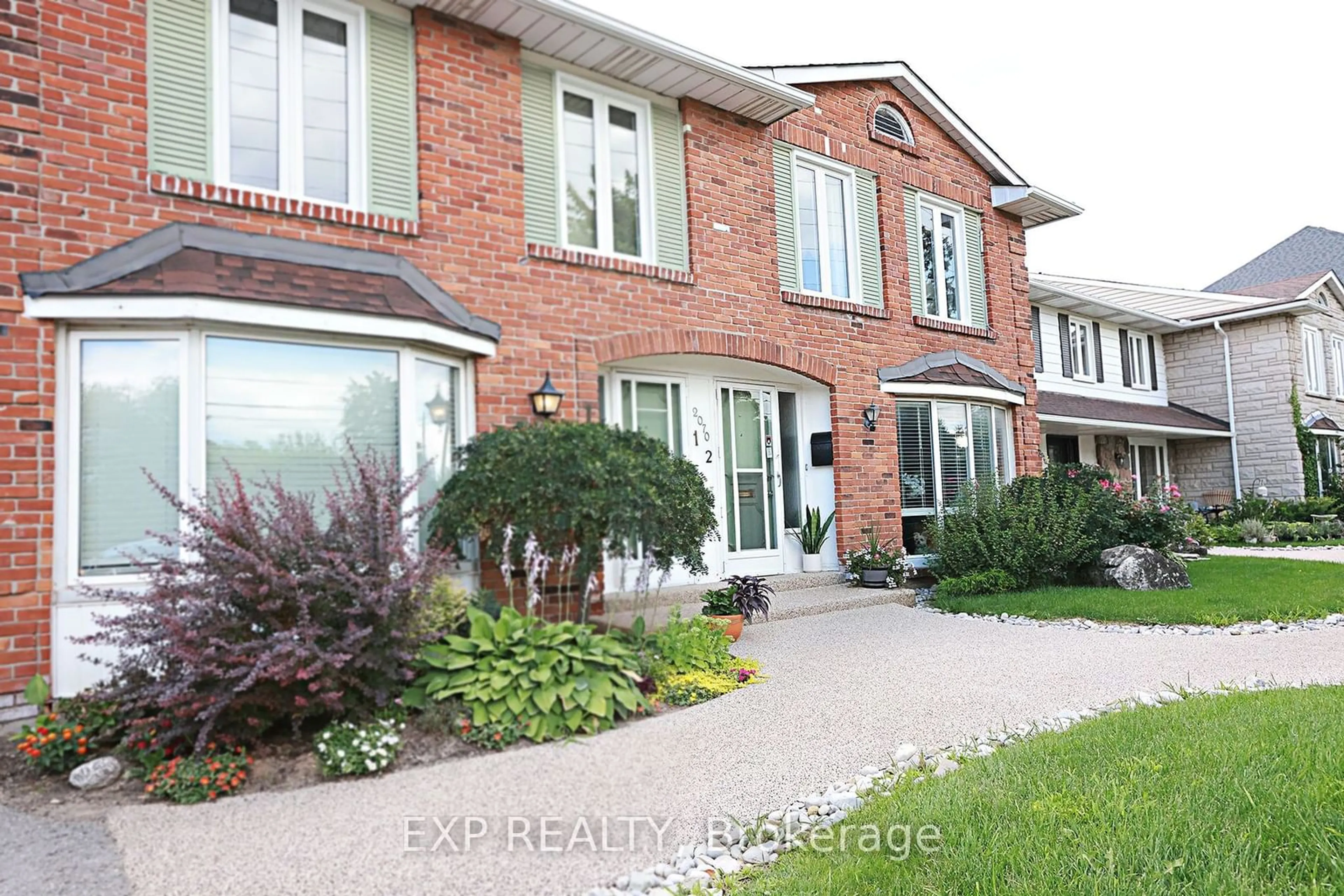 Home with brick exterior material for 2070 Brant St #2, Burlington Ontario L7P 3A6