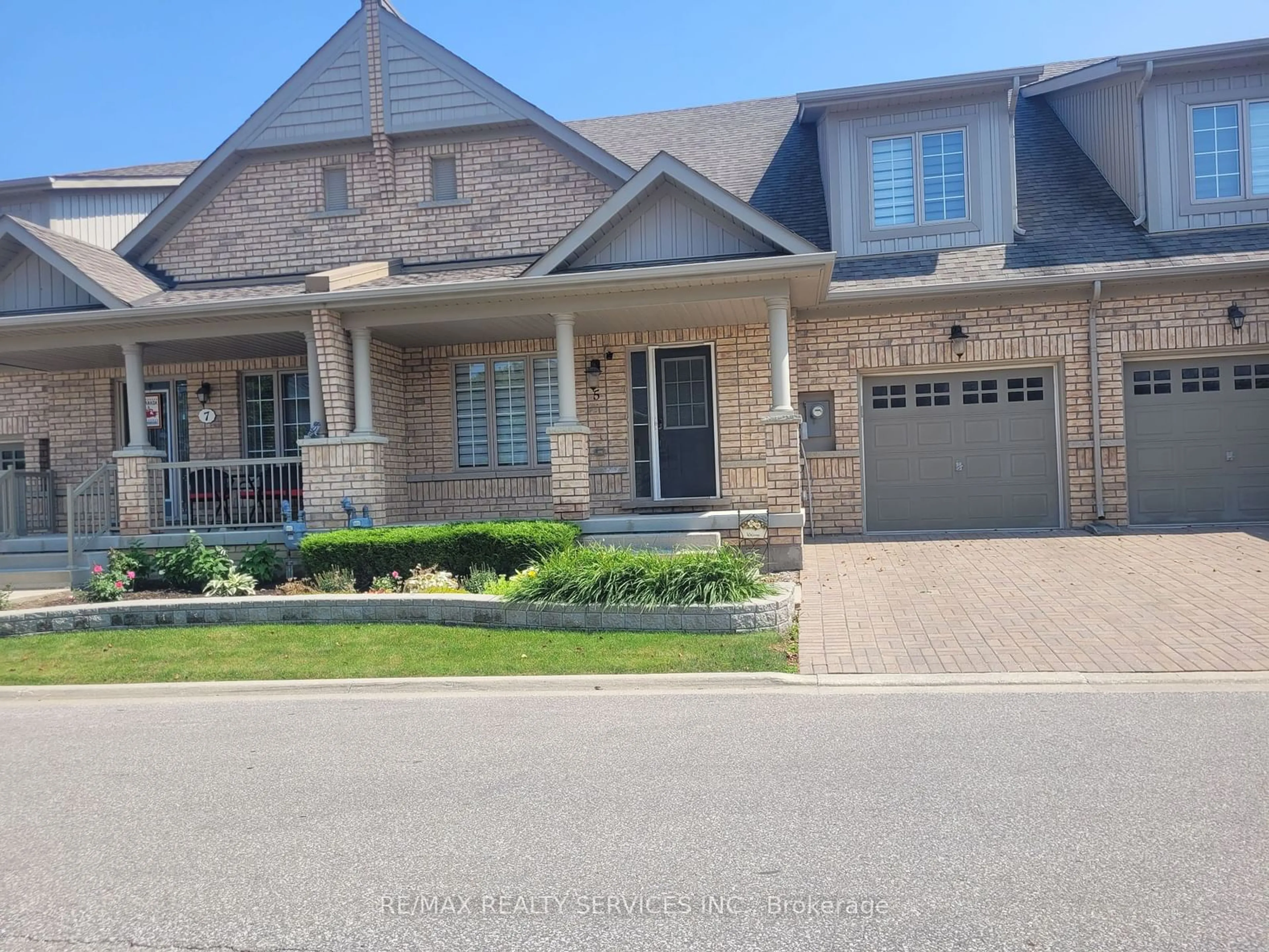 Home with brick exterior material for 5 Lacorra Way #49, Brampton Ontario L6R 3P2