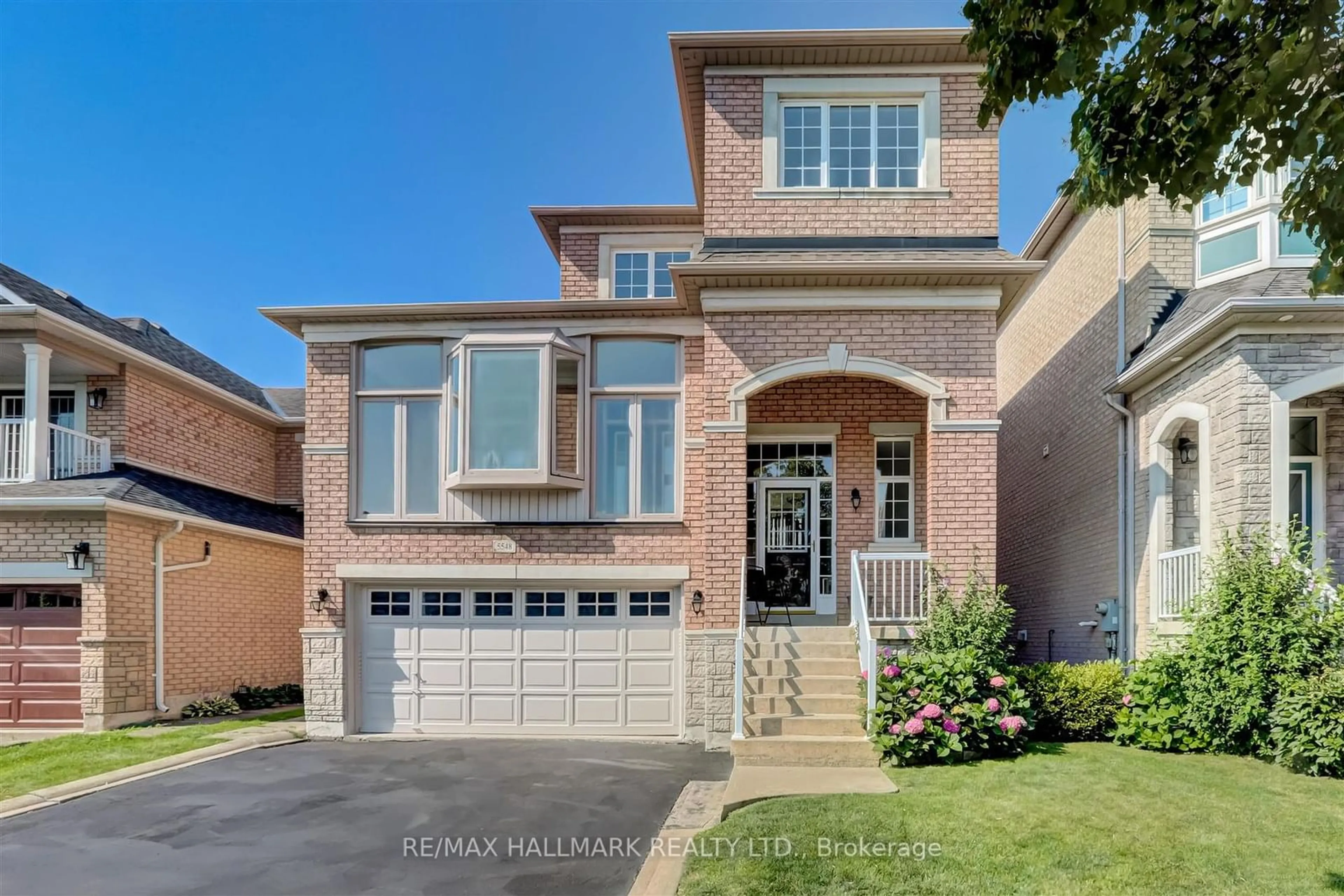 Home with brick exterior material for 5548 Heathcote Walk, Mississauga Ontario L5M 6M7