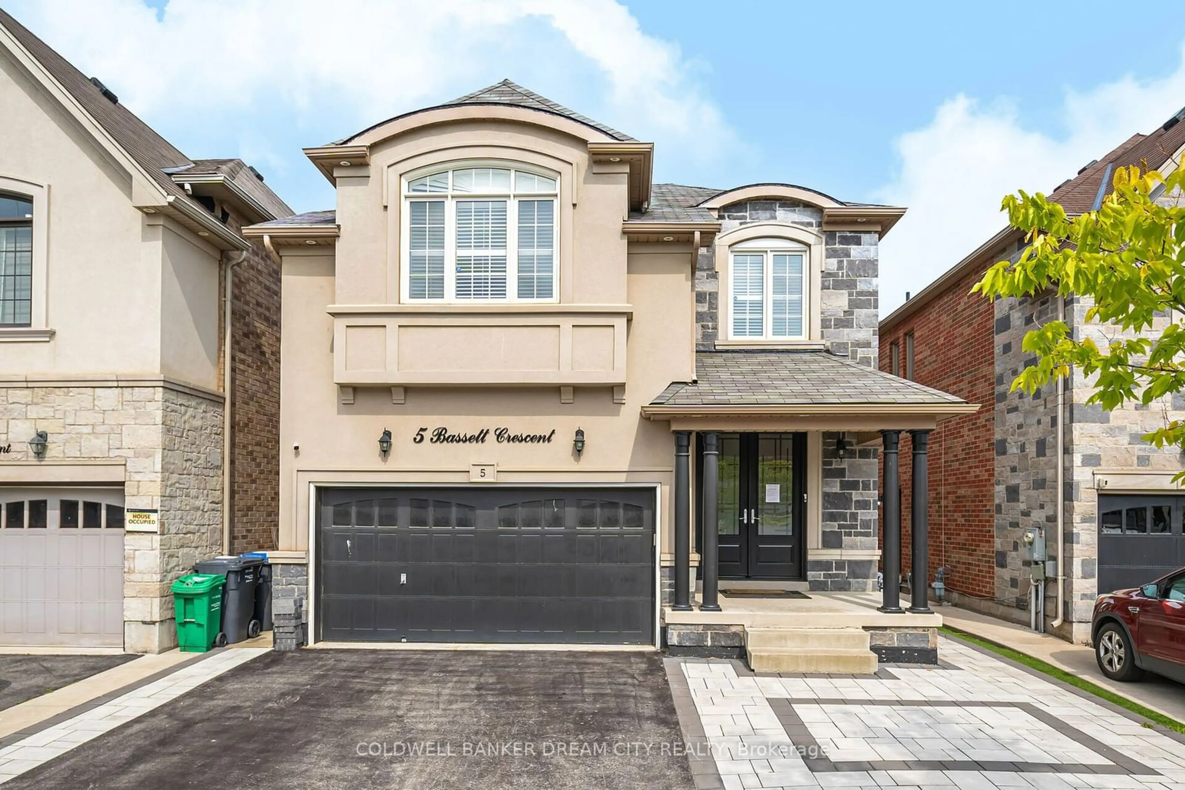 Home with brick exterior material for 5 Bassett Cres, Brampton Ontario L6X 5G2