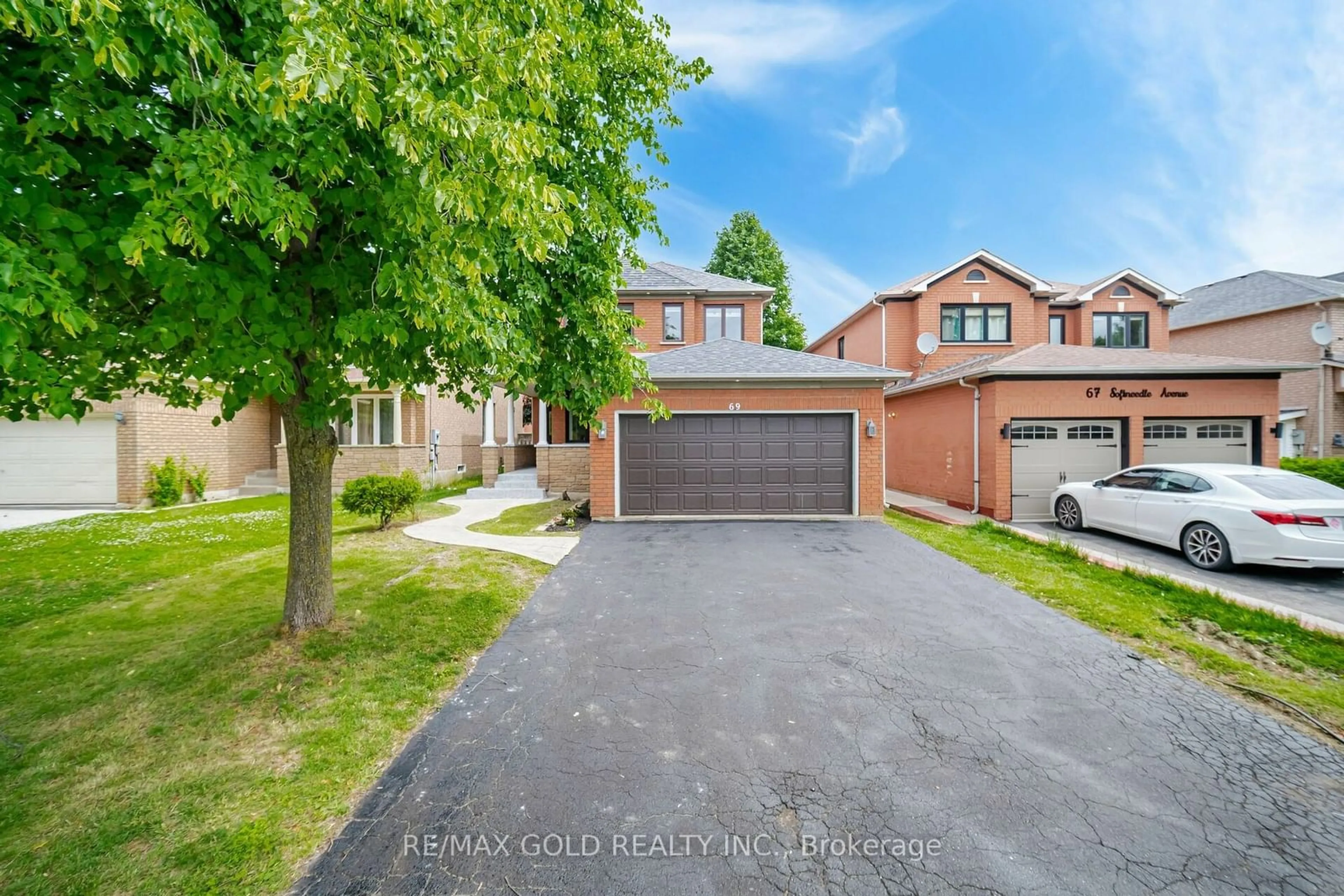 Frontside or backside of a home for 69 Softneedle Ave, Brampton Ontario L6R 1K9