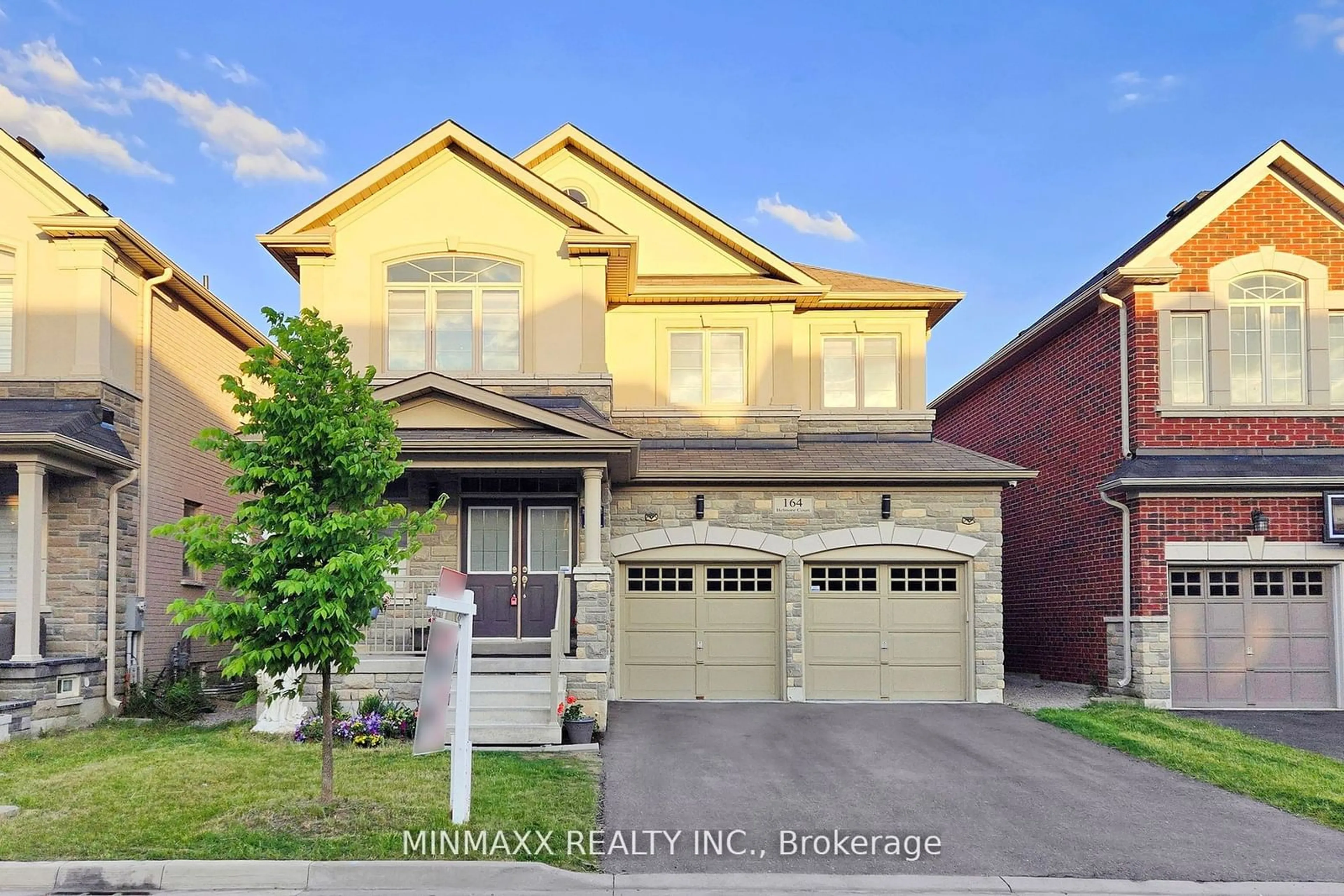 Frontside or backside of a home for 164 Belmore Crt, Milton Ontario L9E 1H5