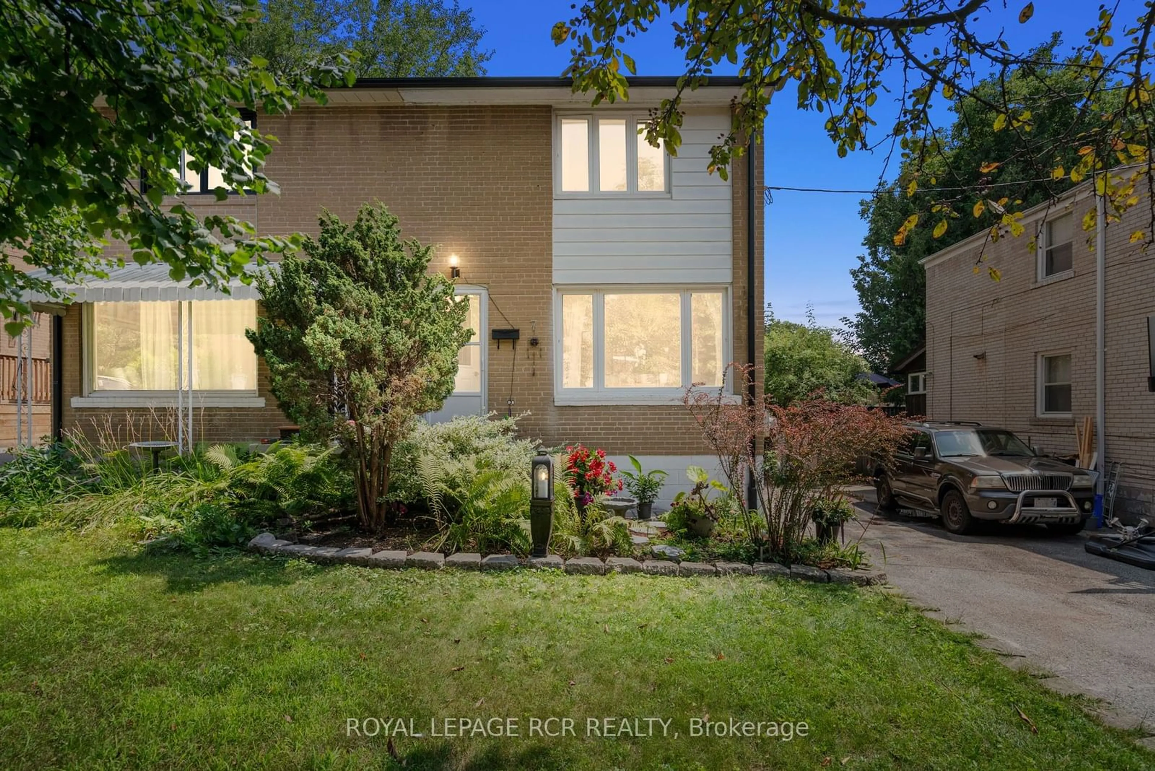 Frontside or backside of a home, the fenced backyard for 7 Kentucky Ave, Toronto Ontario M6S 2N6