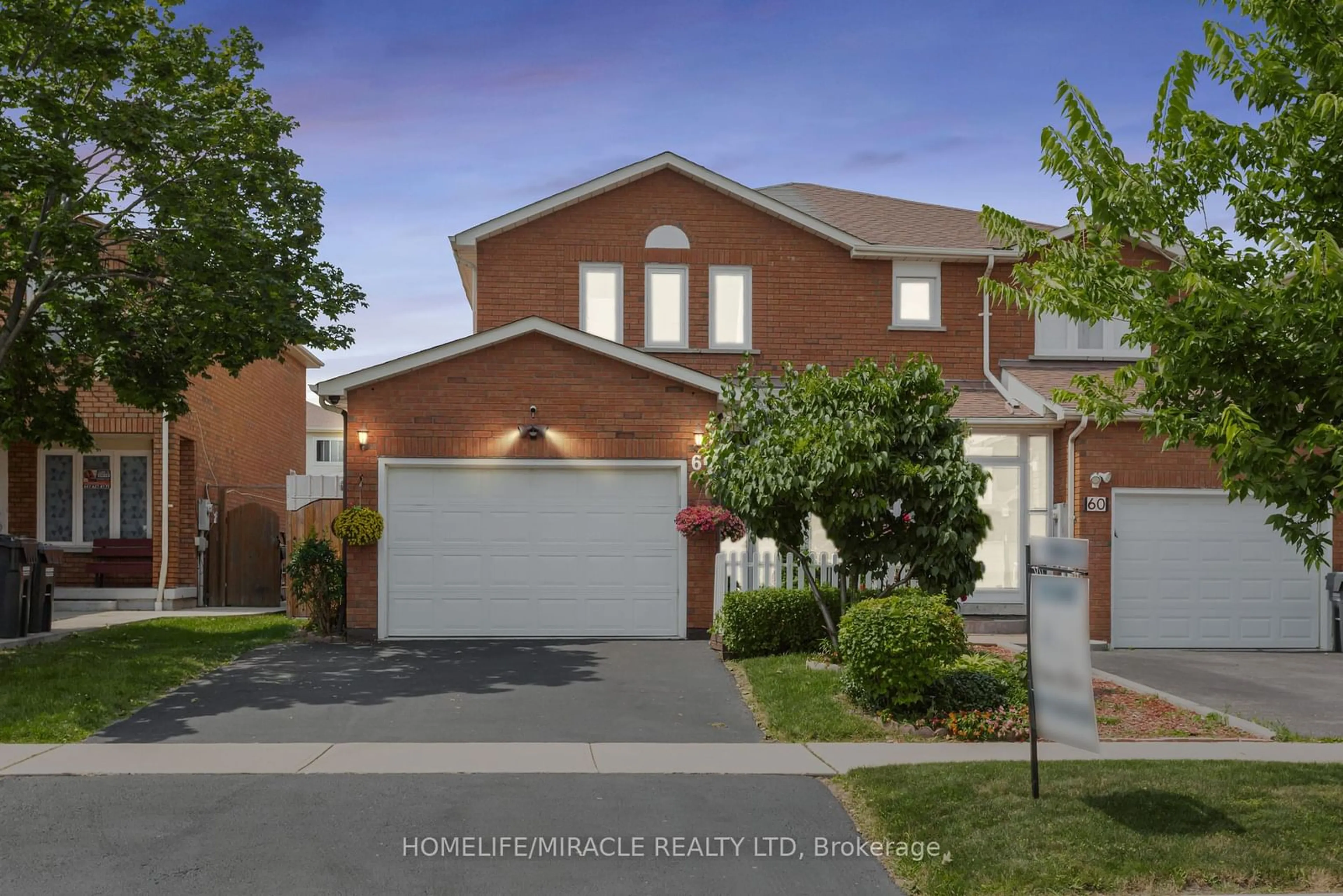 Frontside or backside of a home for 62 Tulip Dr, Brampton Ontario L6Y 3W7