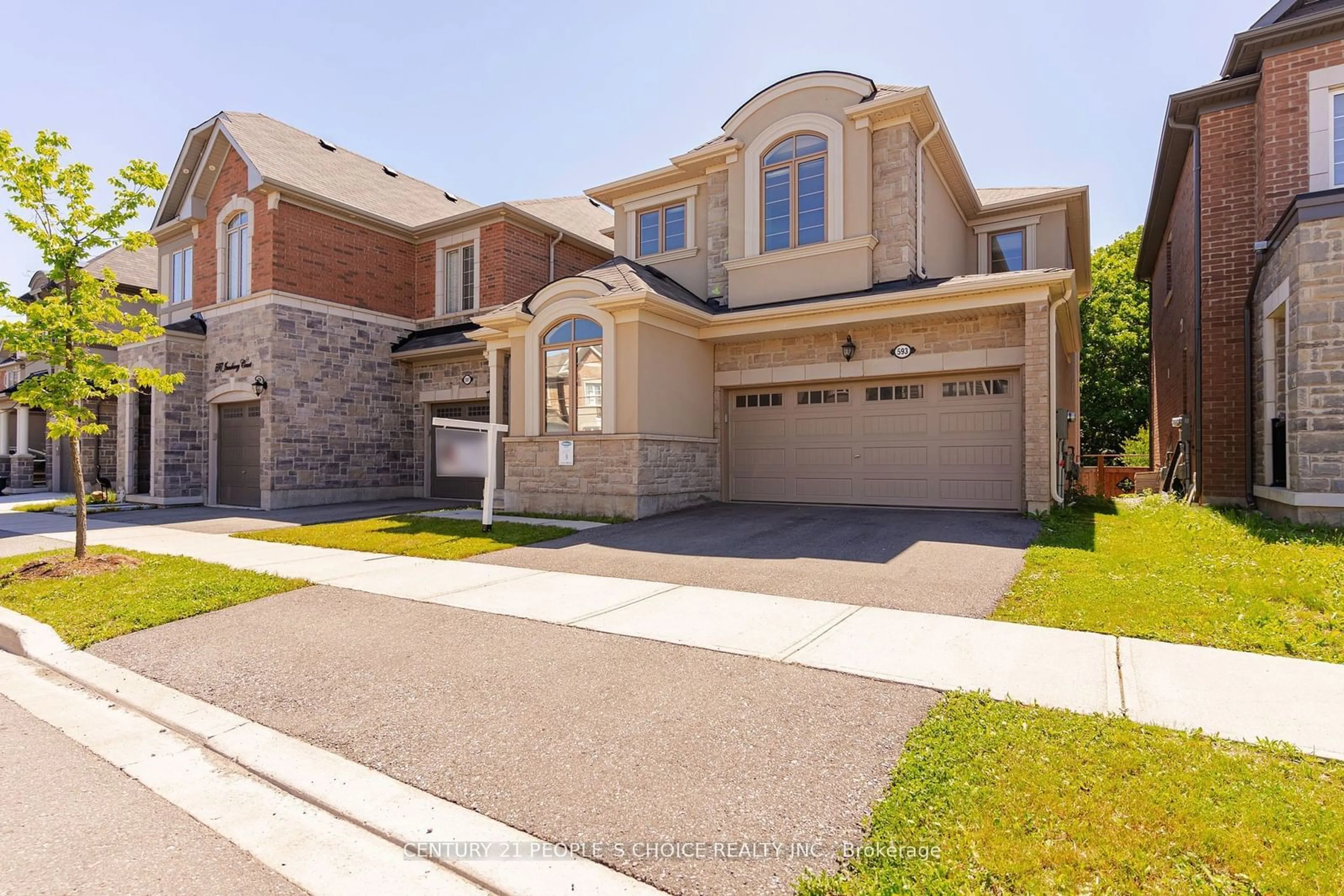 Frontside or backside of a home for 593 Juneberry Crt, Milton Ontario L9E 1M8