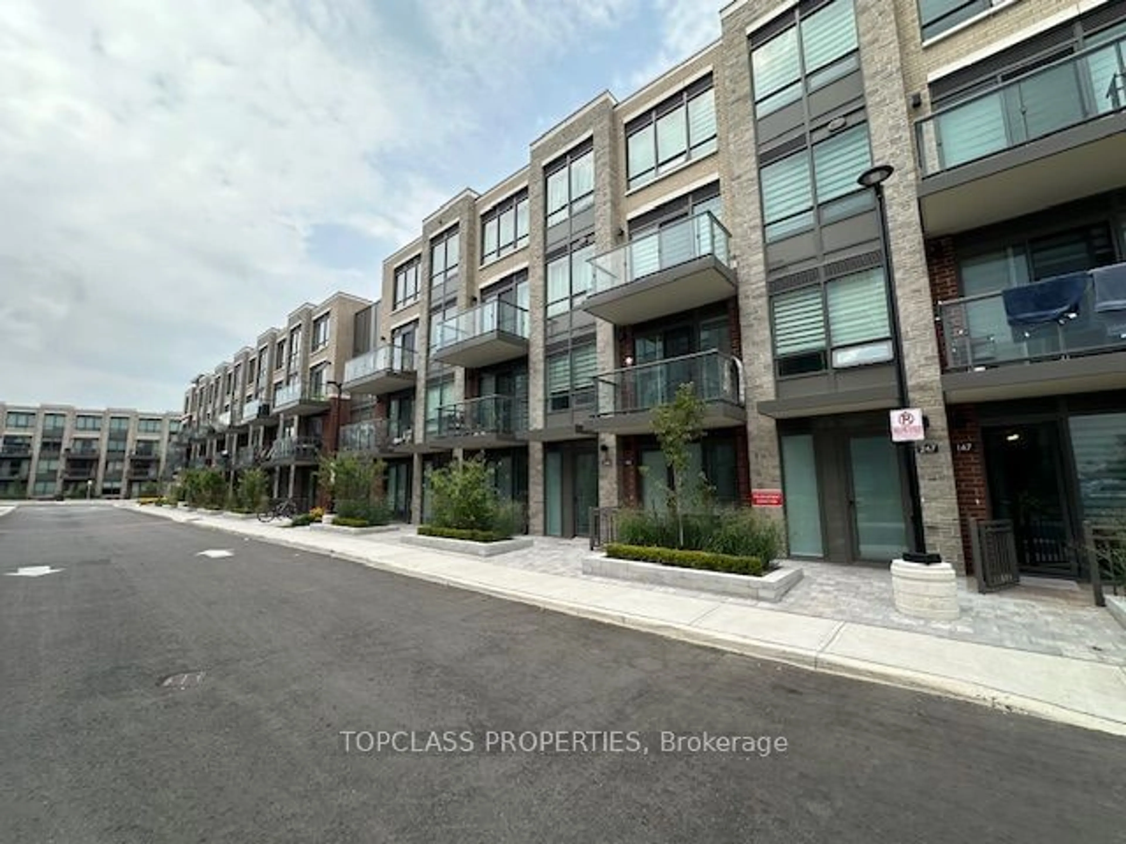 A pic from exterior of the house or condo, the street view for 75 Attmar Dr #357, Brampton Ontario L6P 0Y6