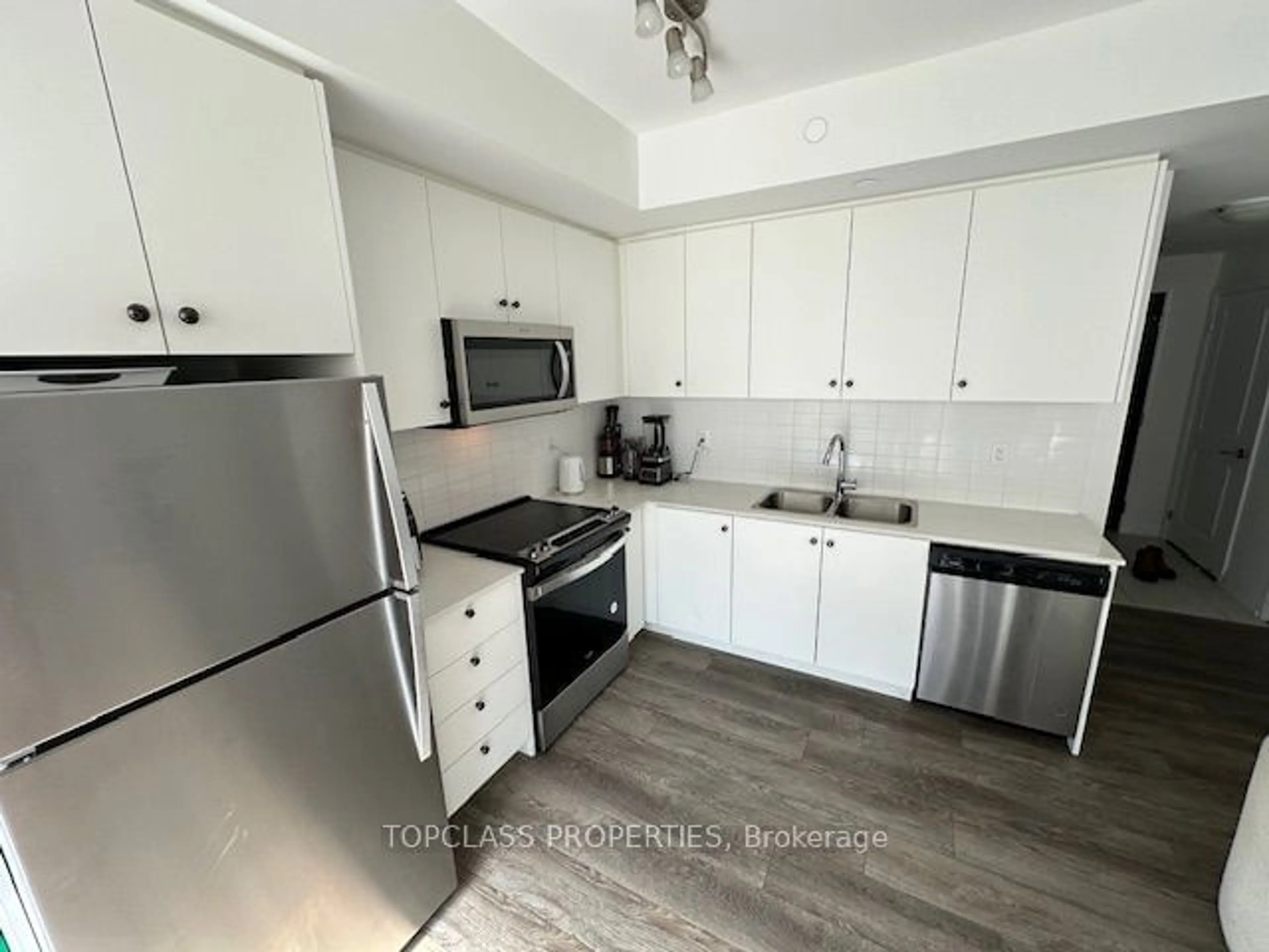 Standard kitchen, wood floors for 75 Attmar Dr #357, Brampton Ontario L6P 0Y6