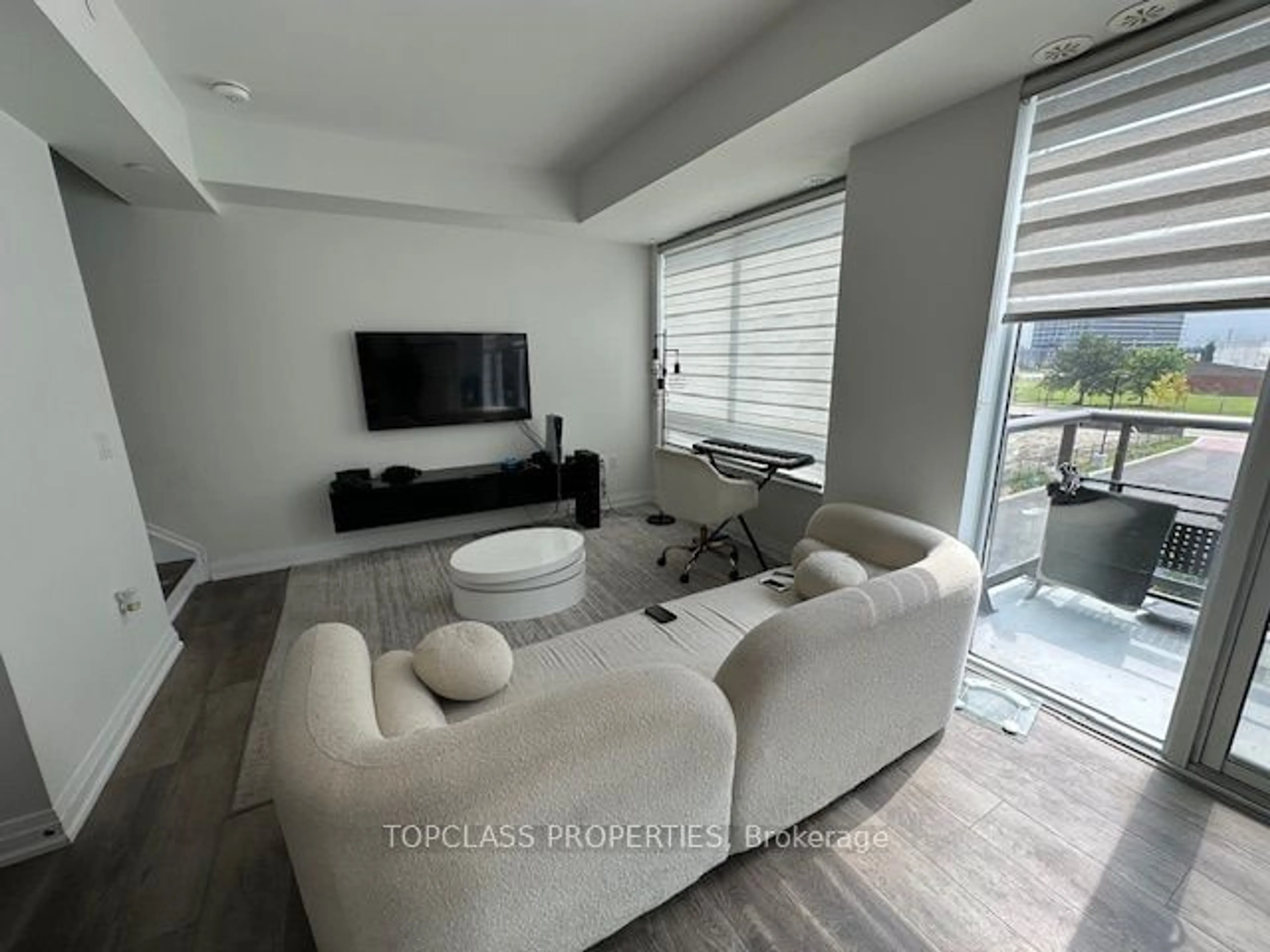 Living room, wood floors for 75 Attmar Dr #357, Brampton Ontario L6P 0Y6