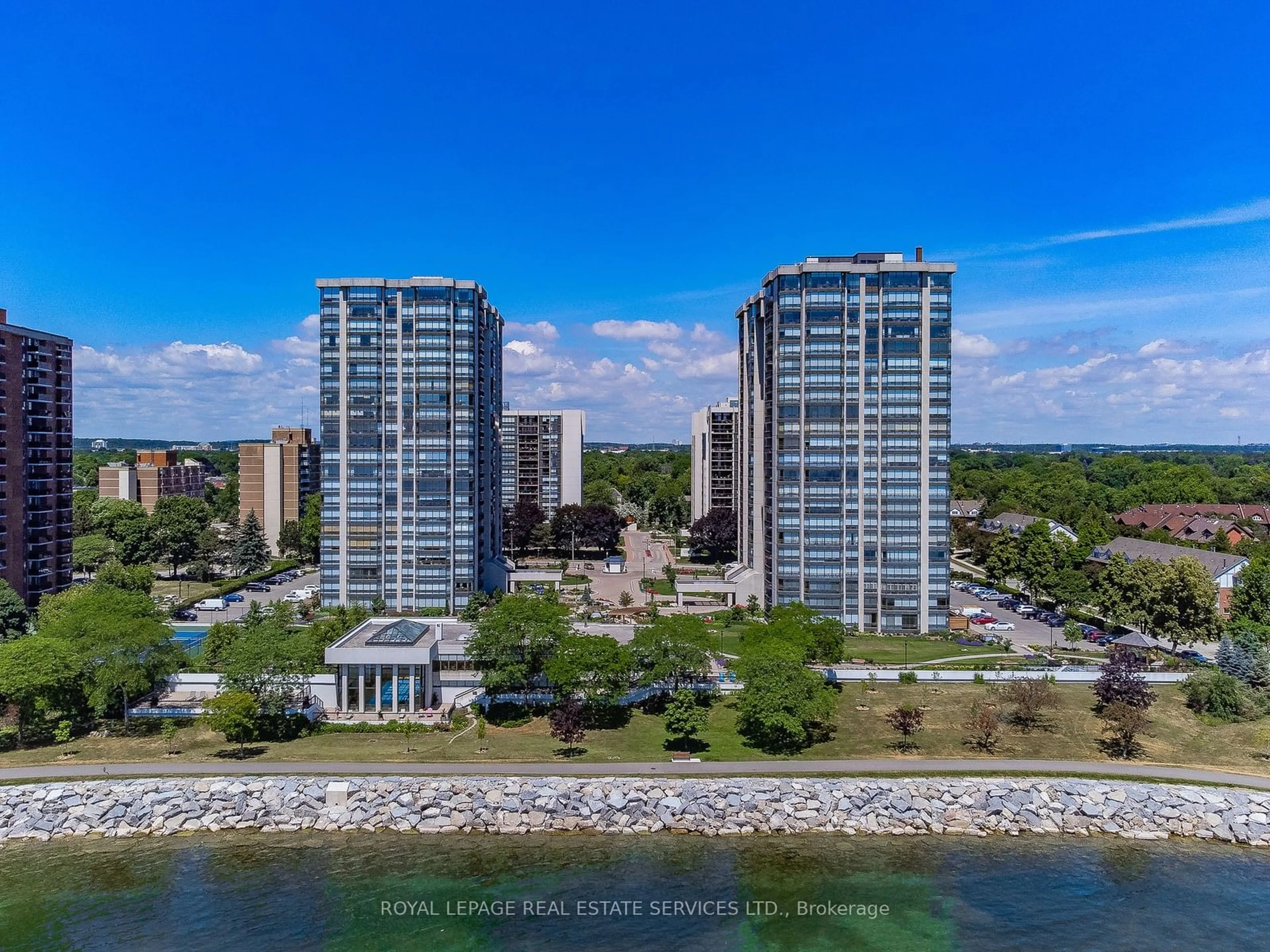 A pic from exterior of the house or condo, the view of city buildings for 2180 Marine Dr #2002, Oakville Ontario L6L 5V2