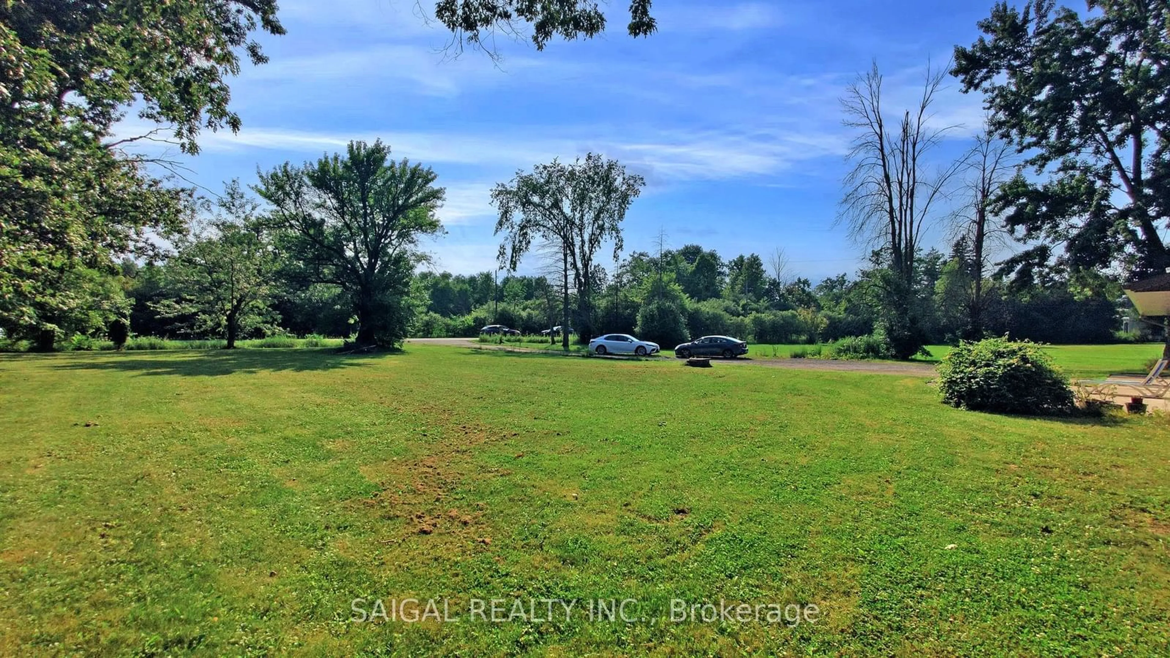 A pic from exterior of the house or condo, the fenced backyard for 8927 Ninth Line, Halton Hills Ontario L0P 1K0