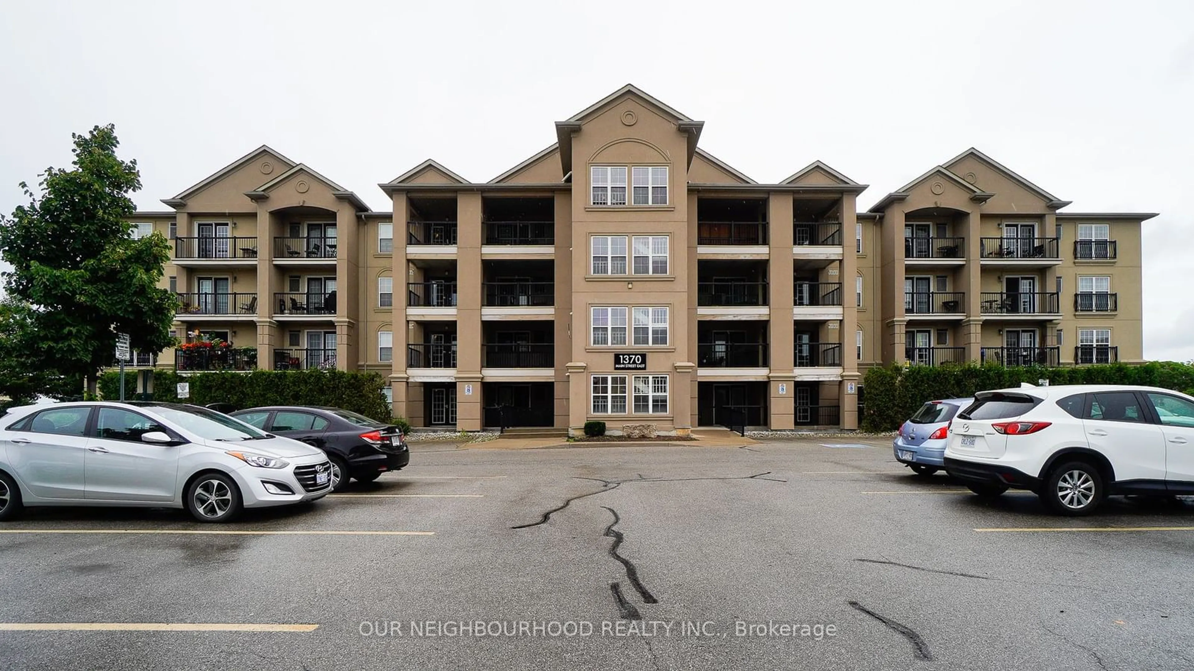 A pic from exterior of the house or condo for 1370 Main St #110, Milton Ontario L9T 7S8