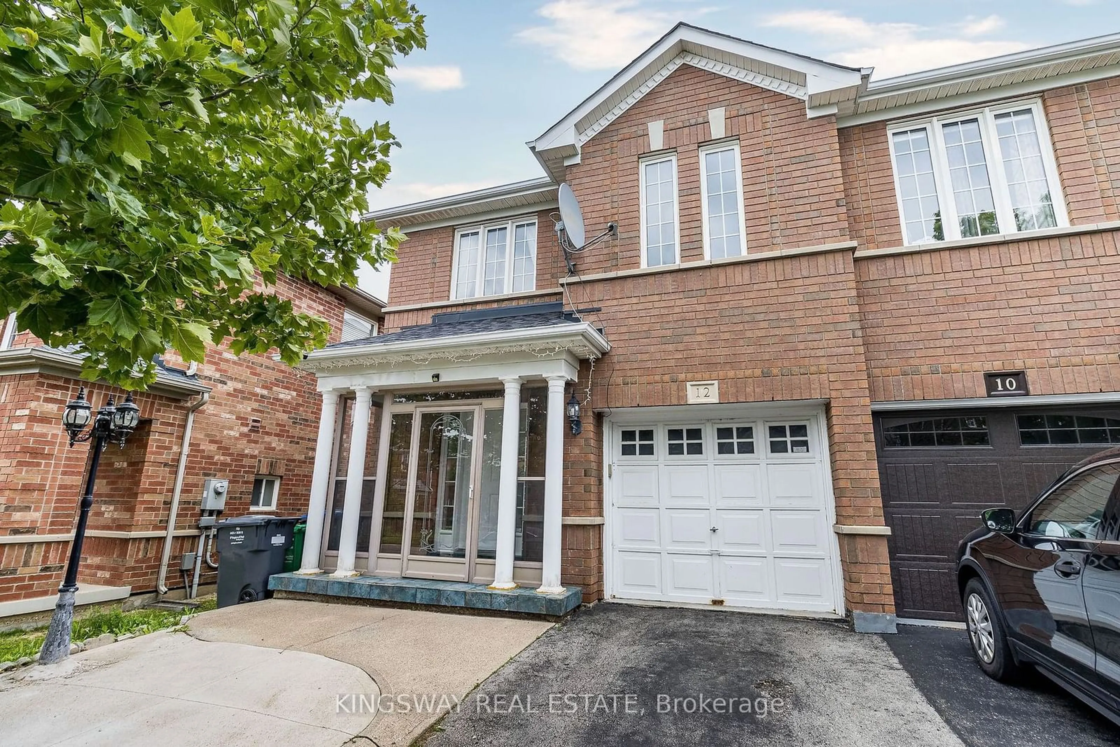 Home with brick exterior material for 12 Tanglemere Cres, Brampton Ontario L7A 1R7