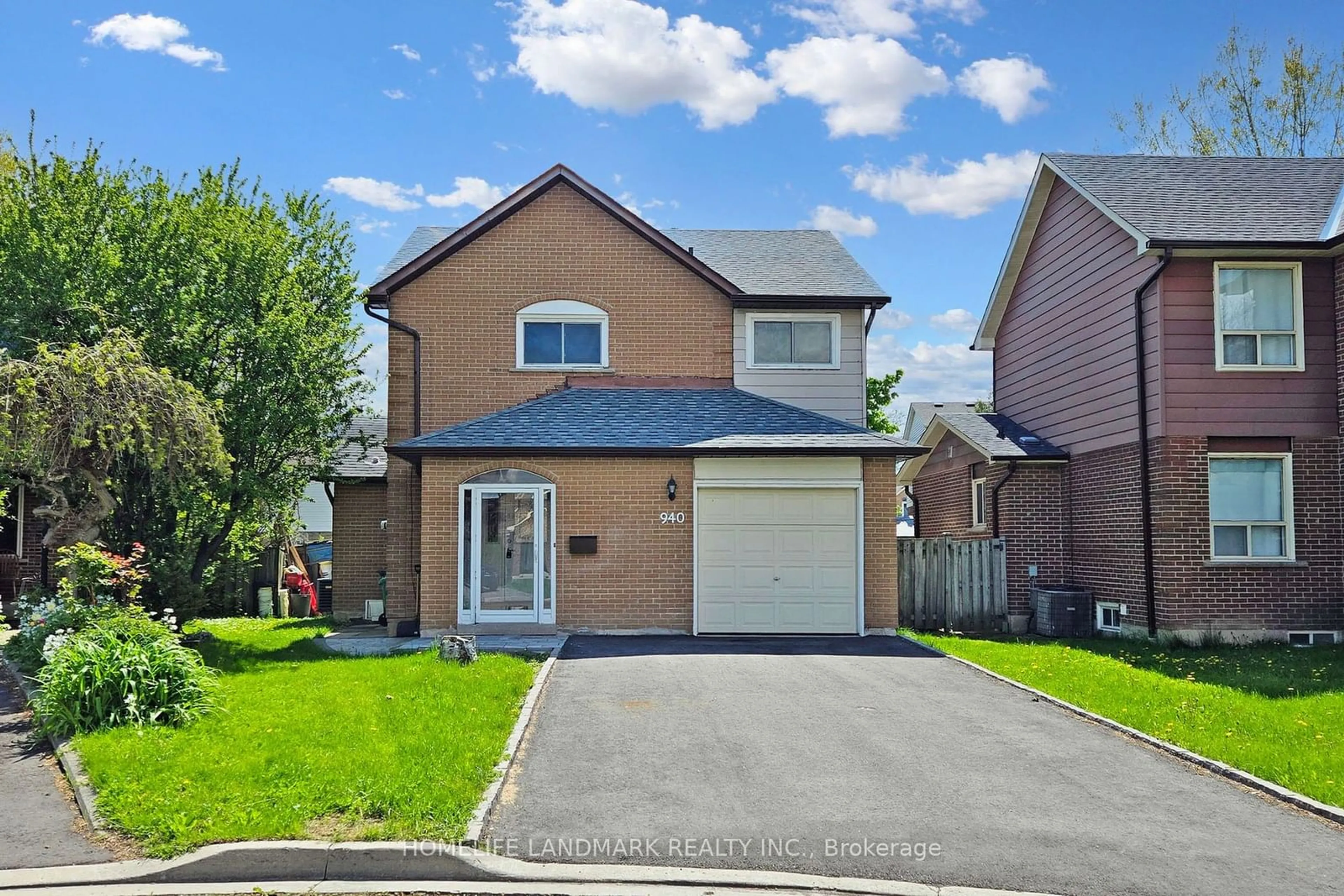 Frontside or backside of a home for 940 Monte Carlo Crt, Mississauga Ontario L5C 3M1