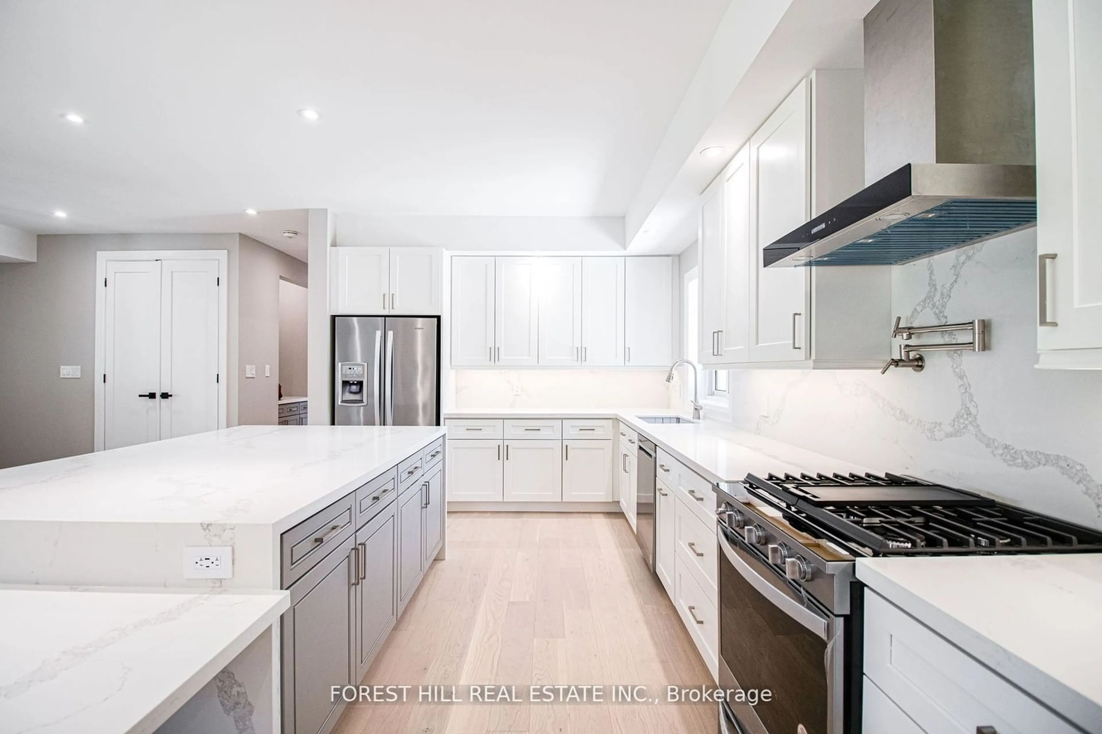 Contemporary kitchen, wood floors for 8 Paramount Crt, Toronto Ontario M6M 2L4