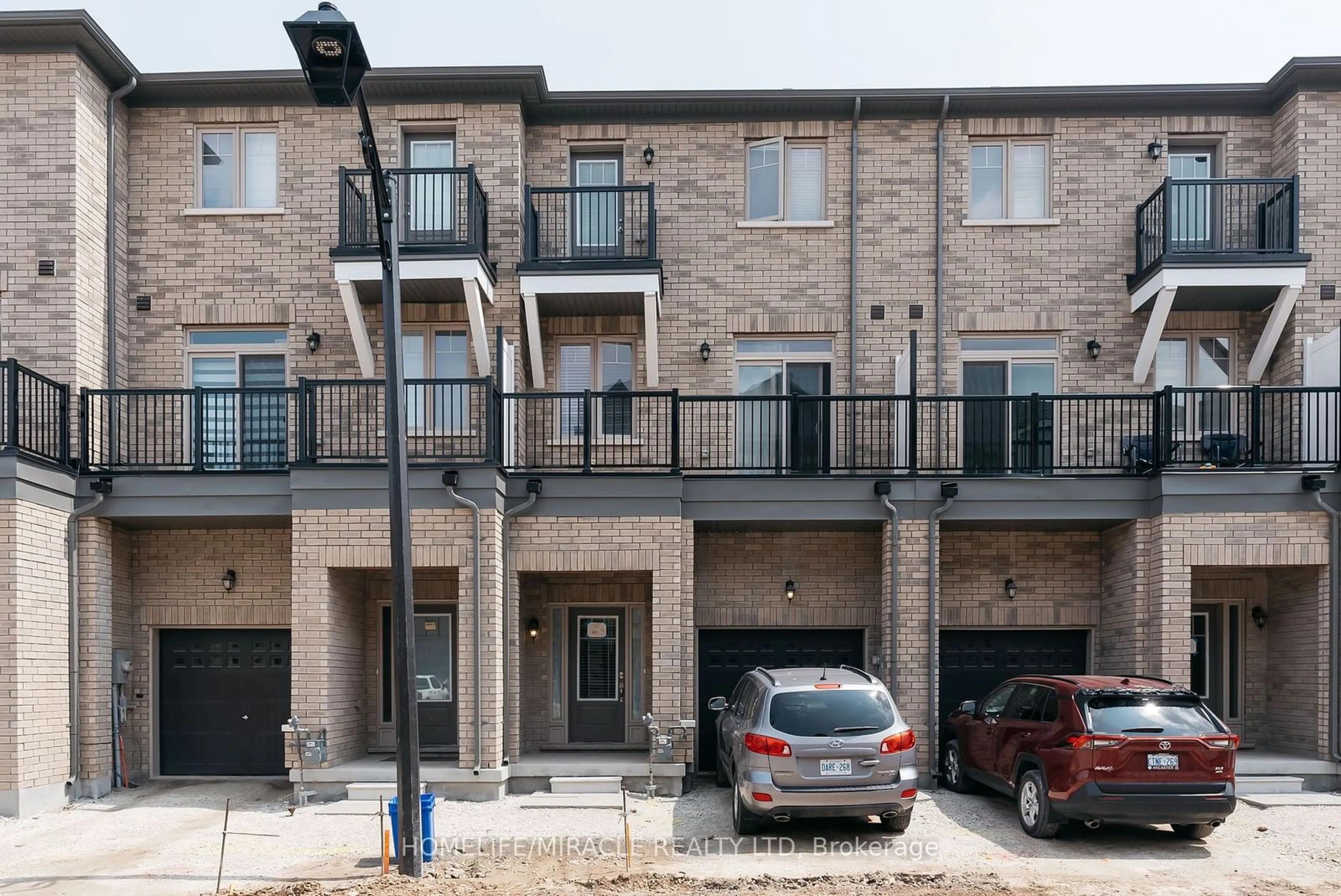 A pic from exterior of the house or condo, the front or back of building for 68 First St #3, Orangeville Ontario L9W 2E4