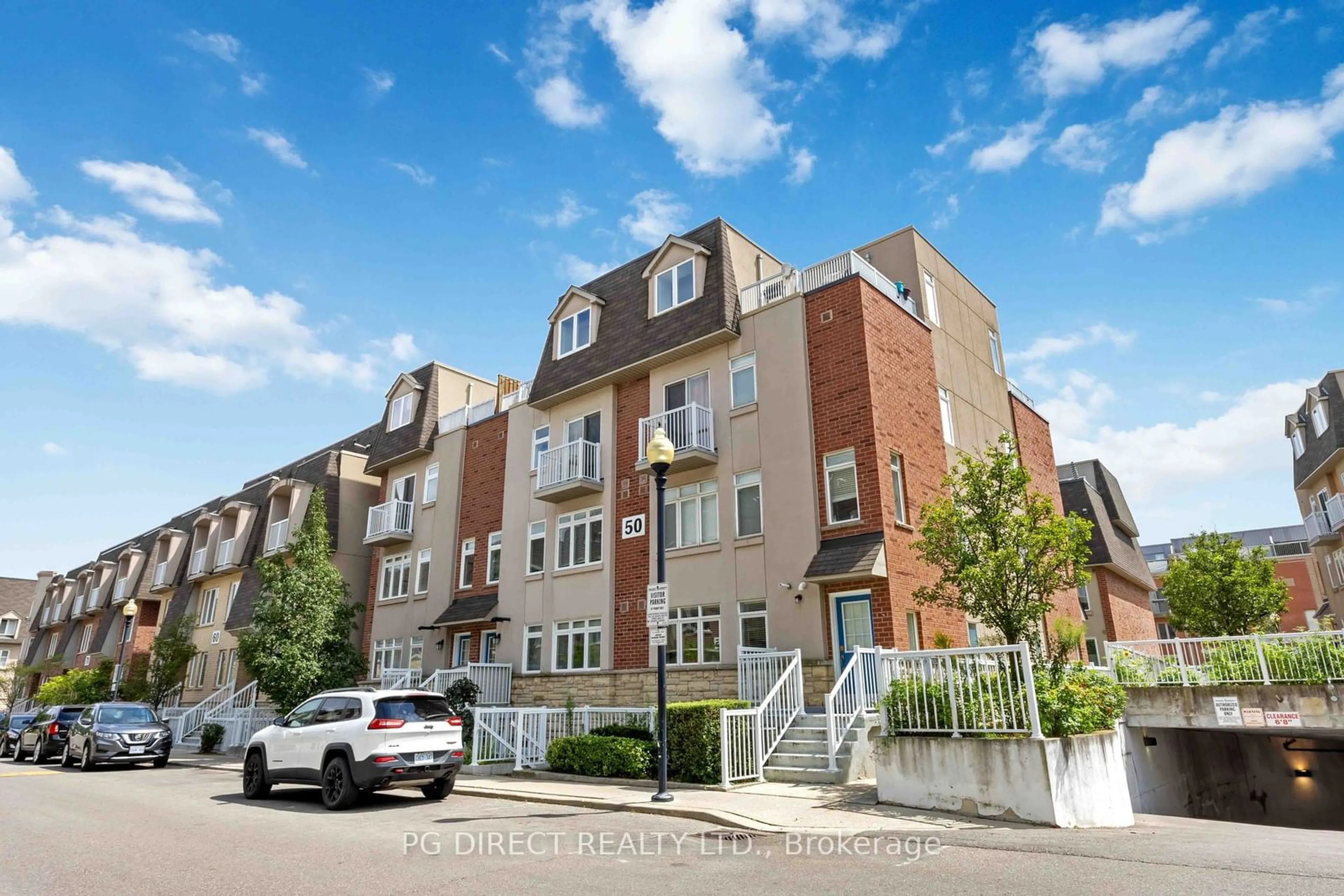 A pic from exterior of the house or condo, the street view for 50 Turntable Cres #57, Toronto Ontario M6H 4K8