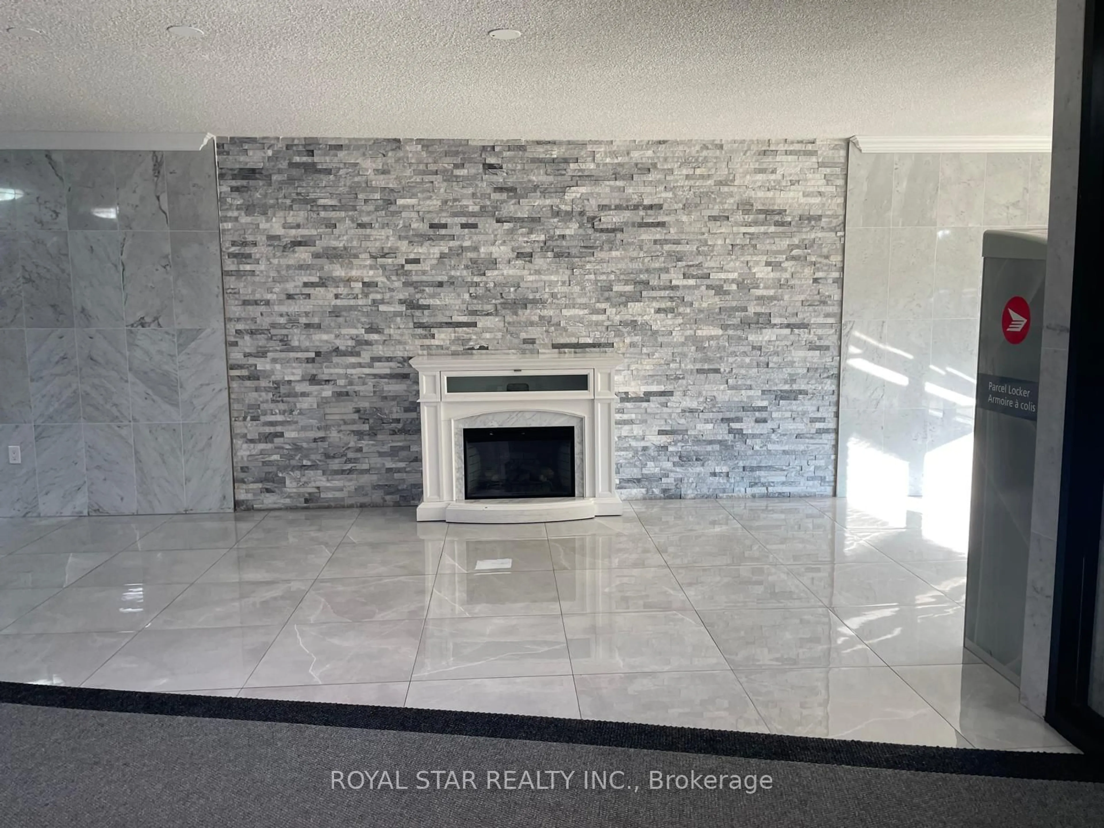 Indoor lobby, cement floor for 4 Kings Cross Rd #1908, Brampton Ontario L6T 3X8