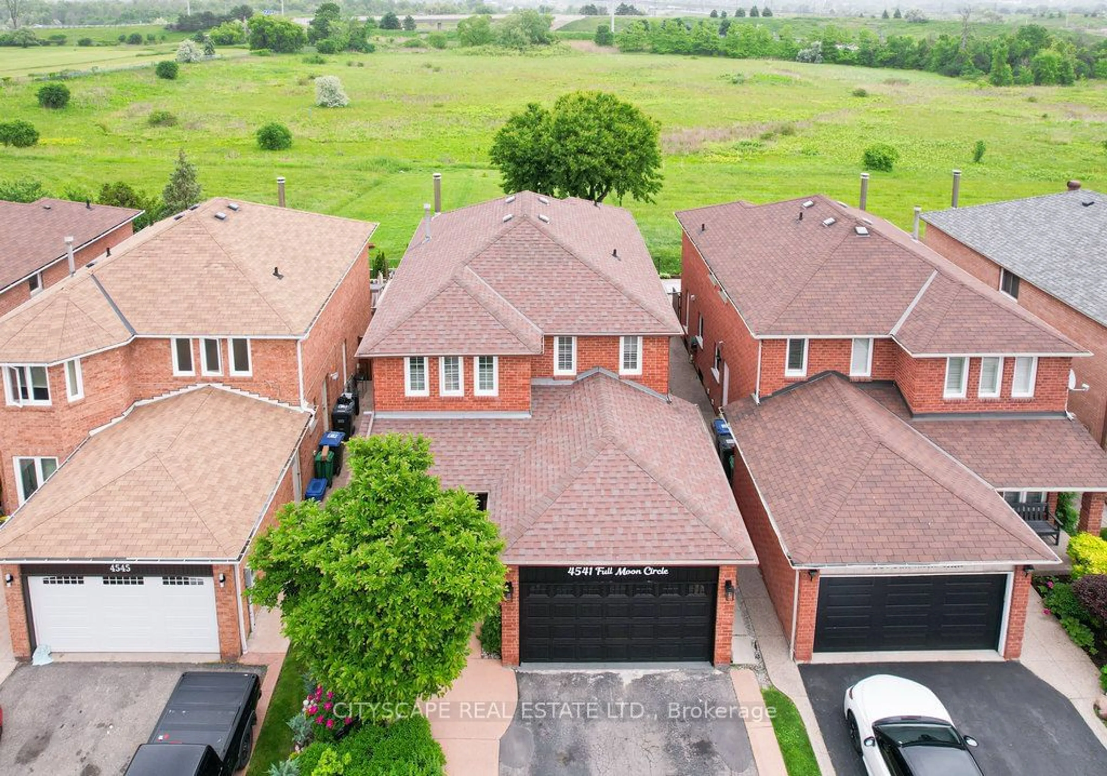 Home with brick exterior material for 4541 Full Moon Circ, Mississauga Ontario L4Z 2L5