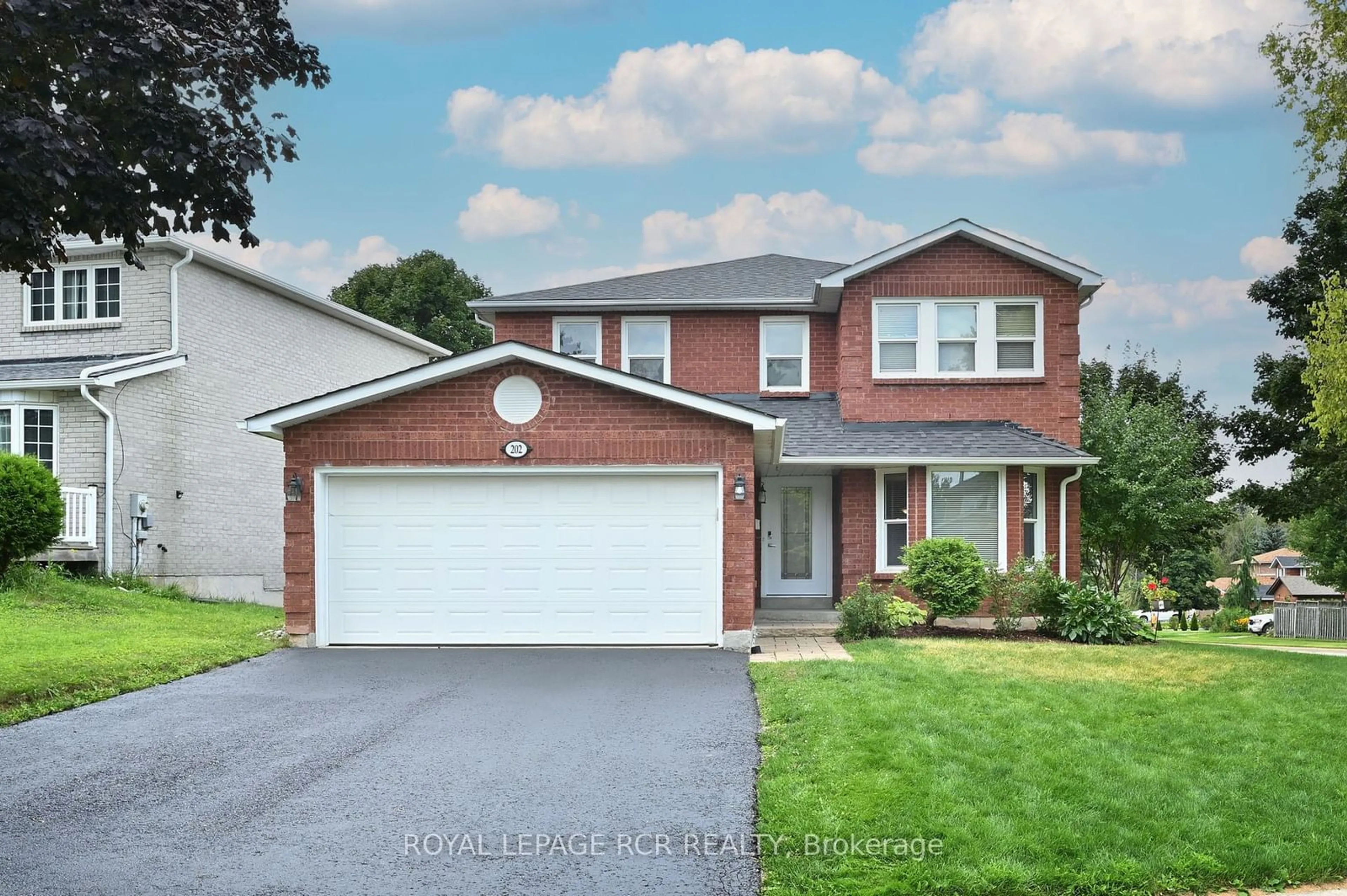 Frontside or backside of a home, the street view for 202 Edenwood Cres, Orangeville Ontario L9W 4M9