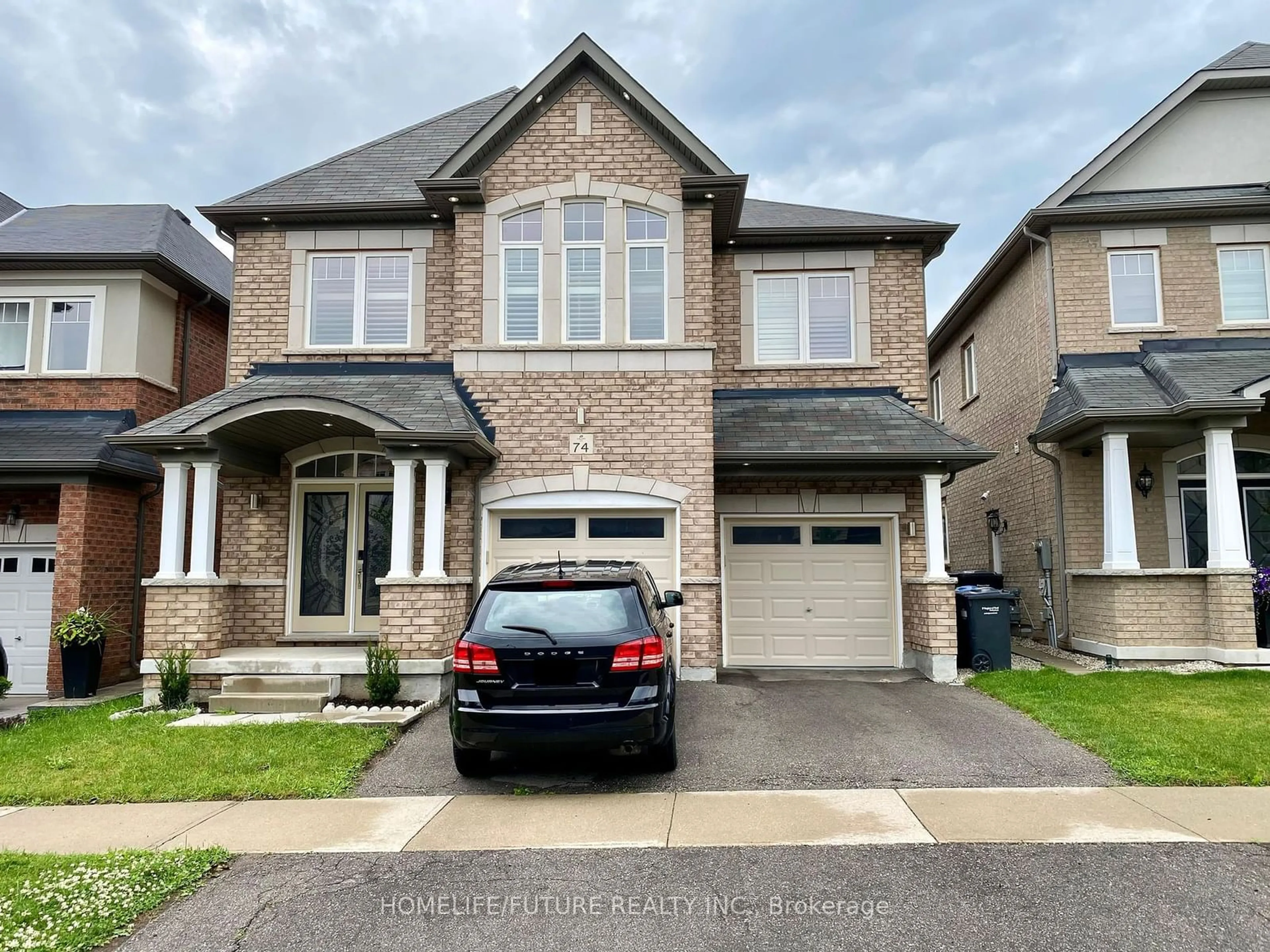 Frontside or backside of a home, the street view for 74 Thornbush Blvd, Brampton Ontario L7A 4K1