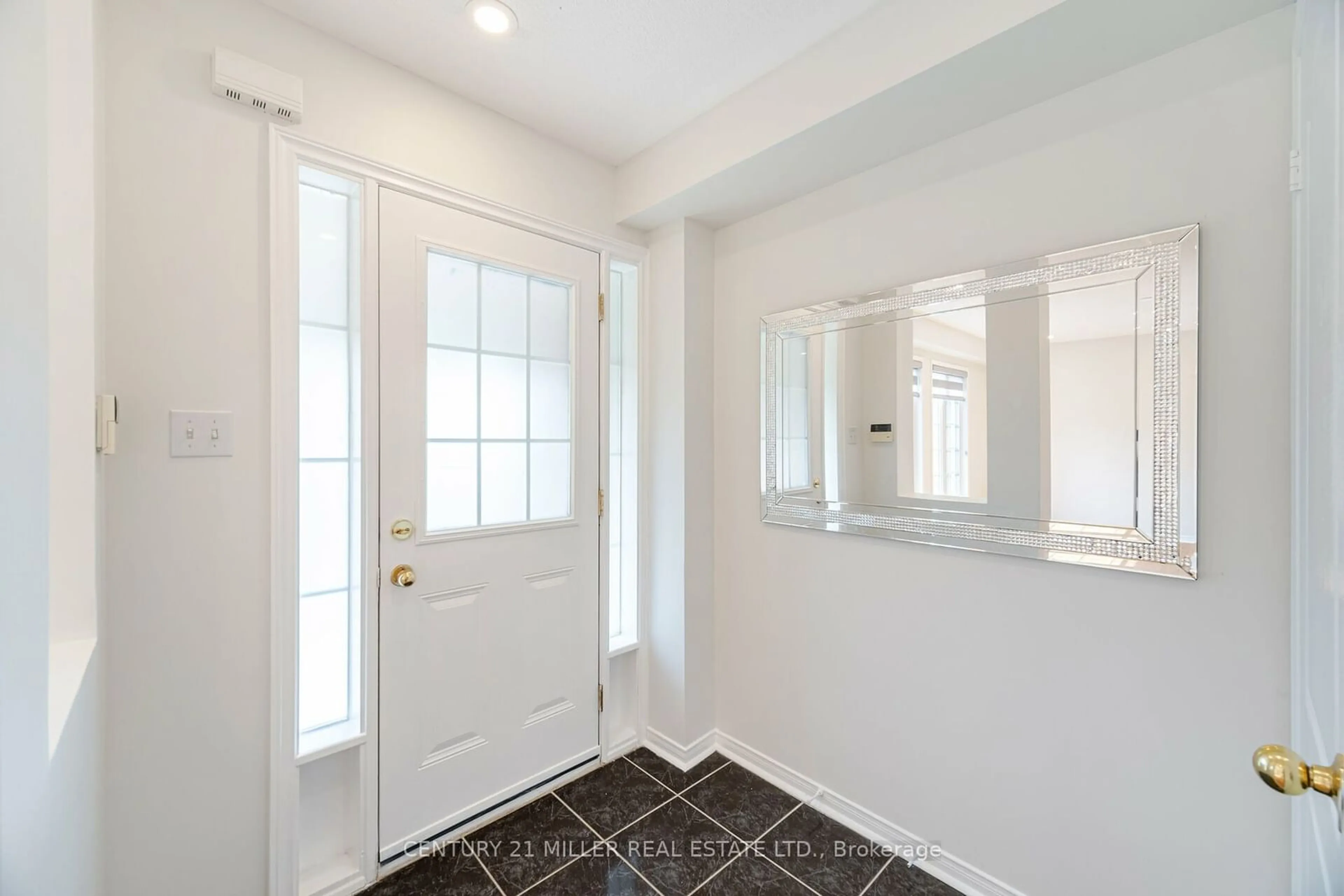 Indoor entryway, wood floors for 5953 Tenth Line, Mississauga Ontario L5M 6K7