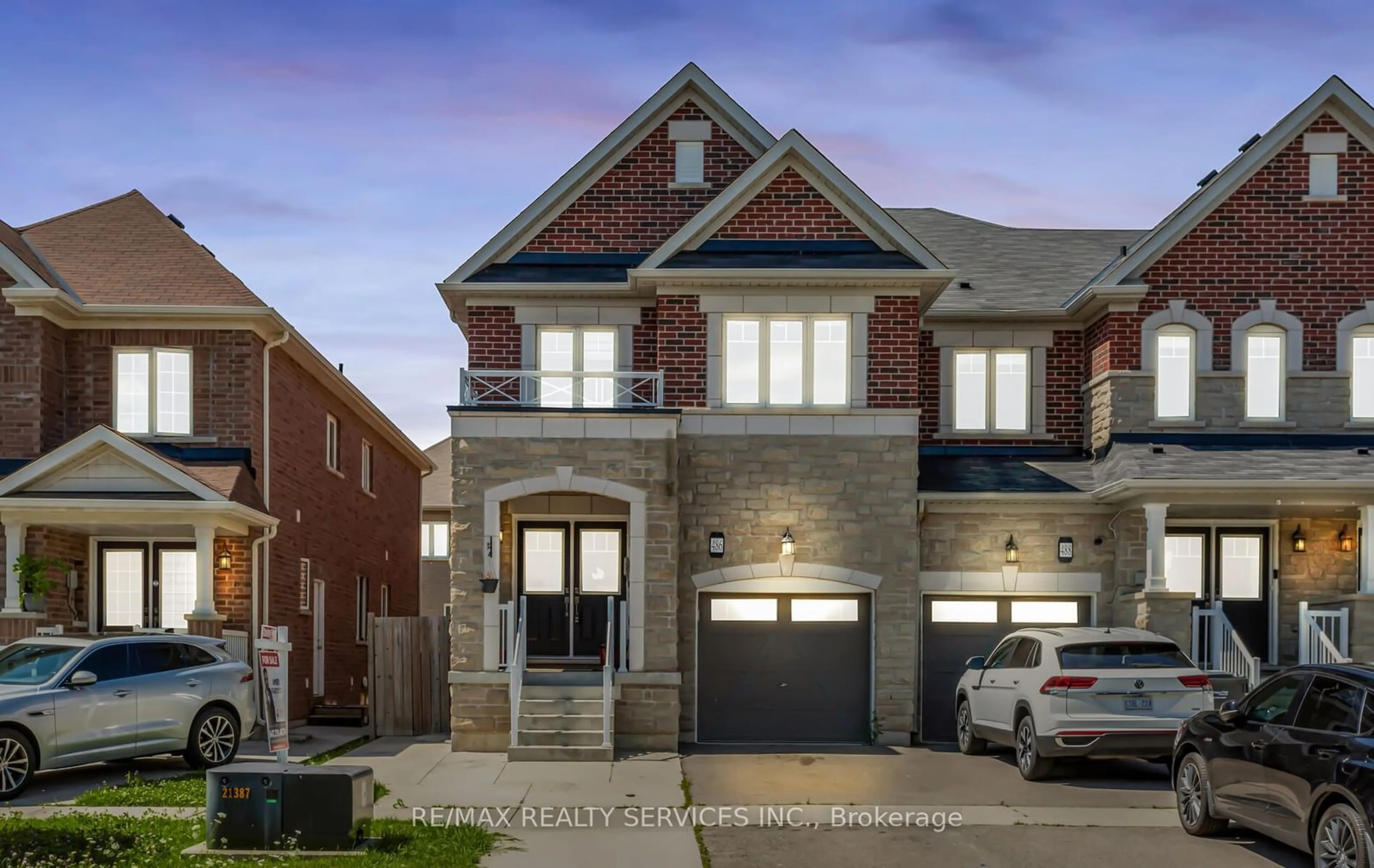 Home with brick exterior material for 486 Queen Mary Dr, Brampton Ontario L7A 4N3