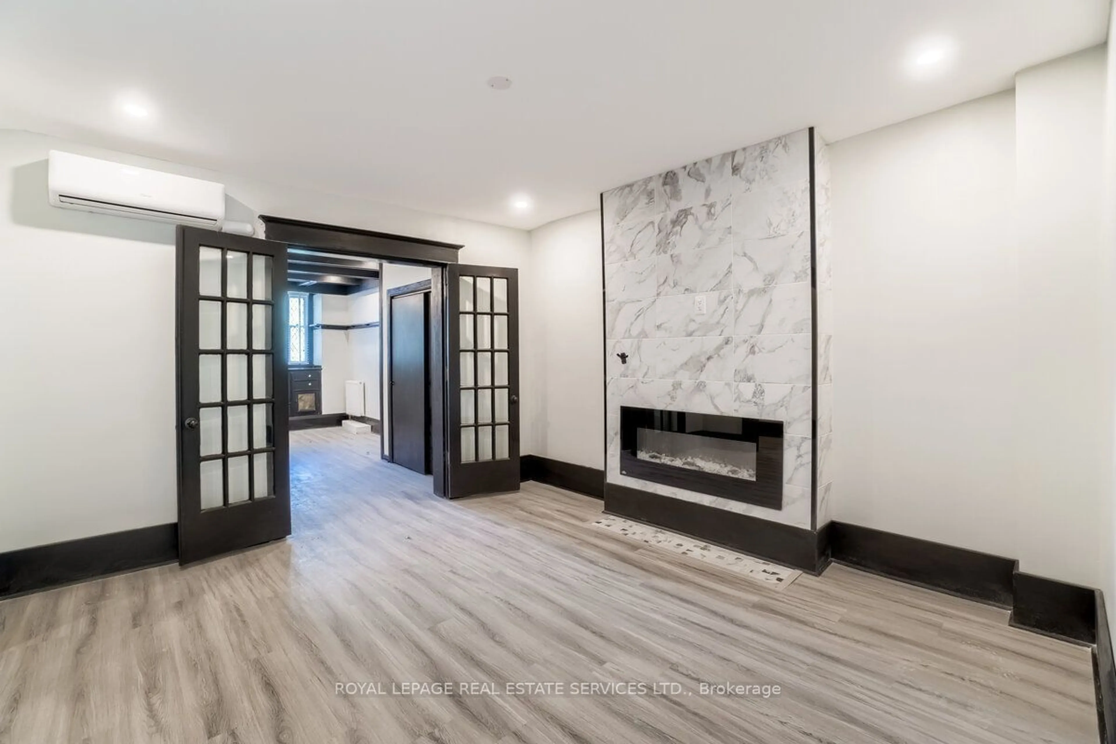 Indoor lobby, wood floors for 31 Tyndall Ave, Toronto Ontario M6K 2E9