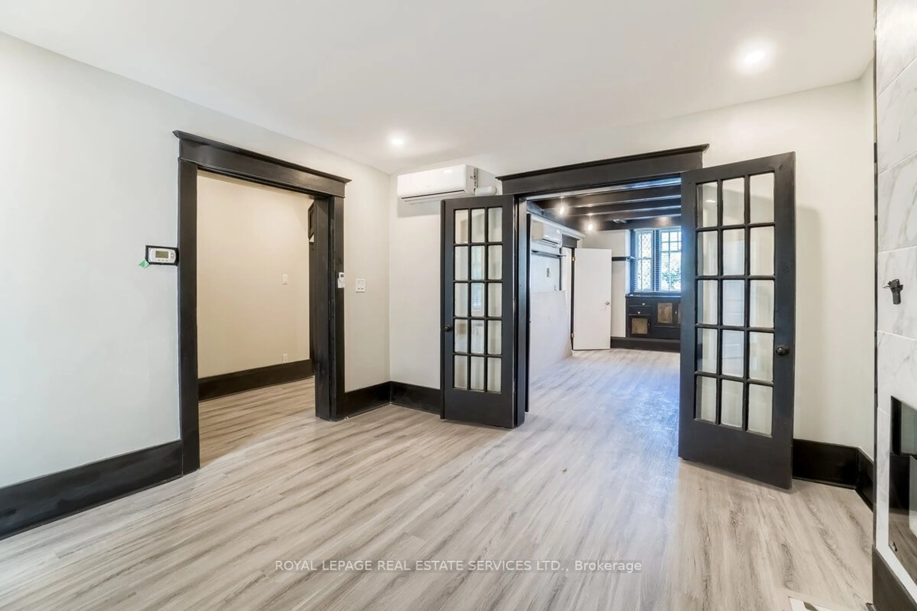 Indoor entryway, wood floors for 31 Tyndall Ave, Toronto Ontario M6K 2E9