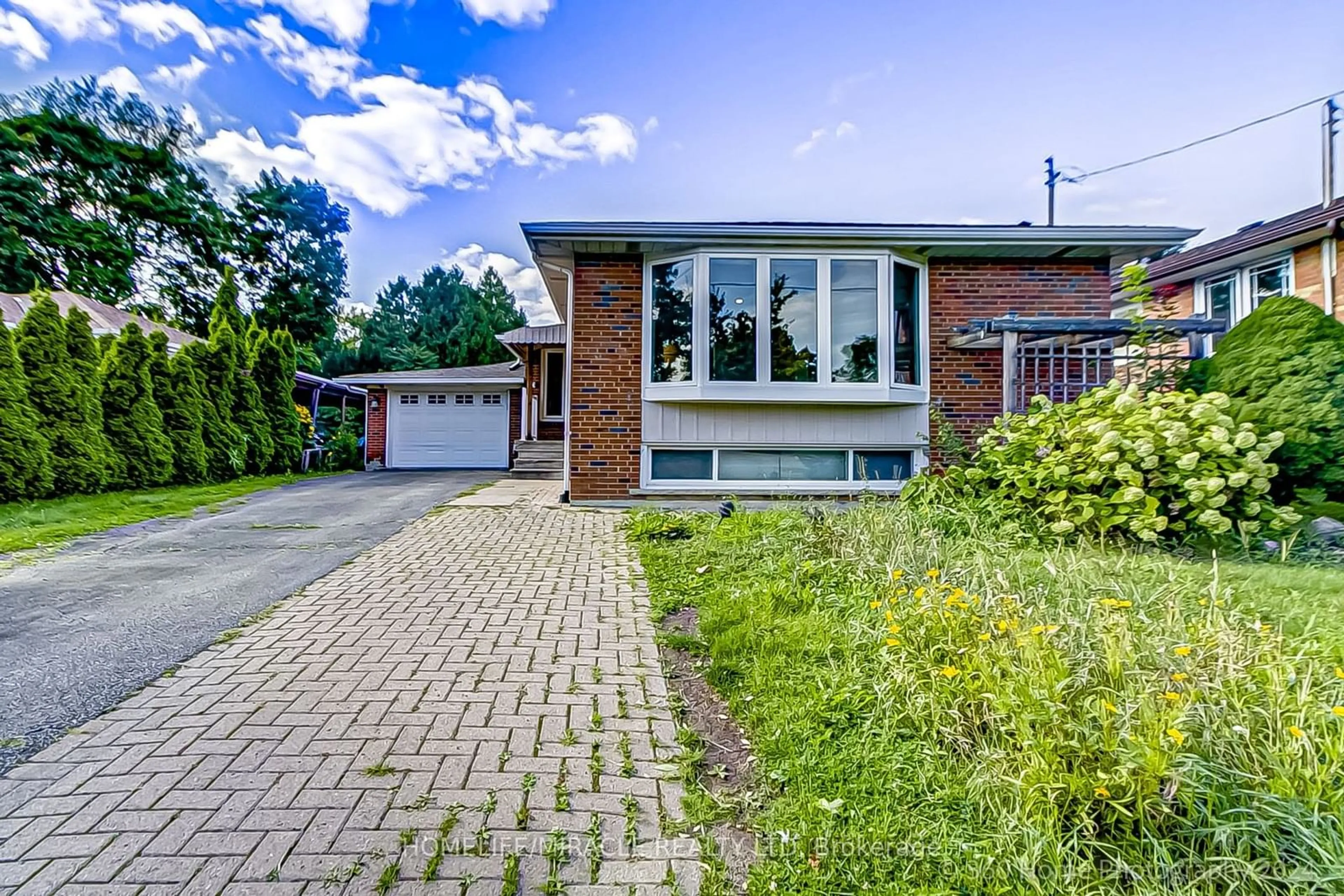 Home with brick exterior material for 30 Fallowfield Rd, Toronto Ontario M9W 2W2