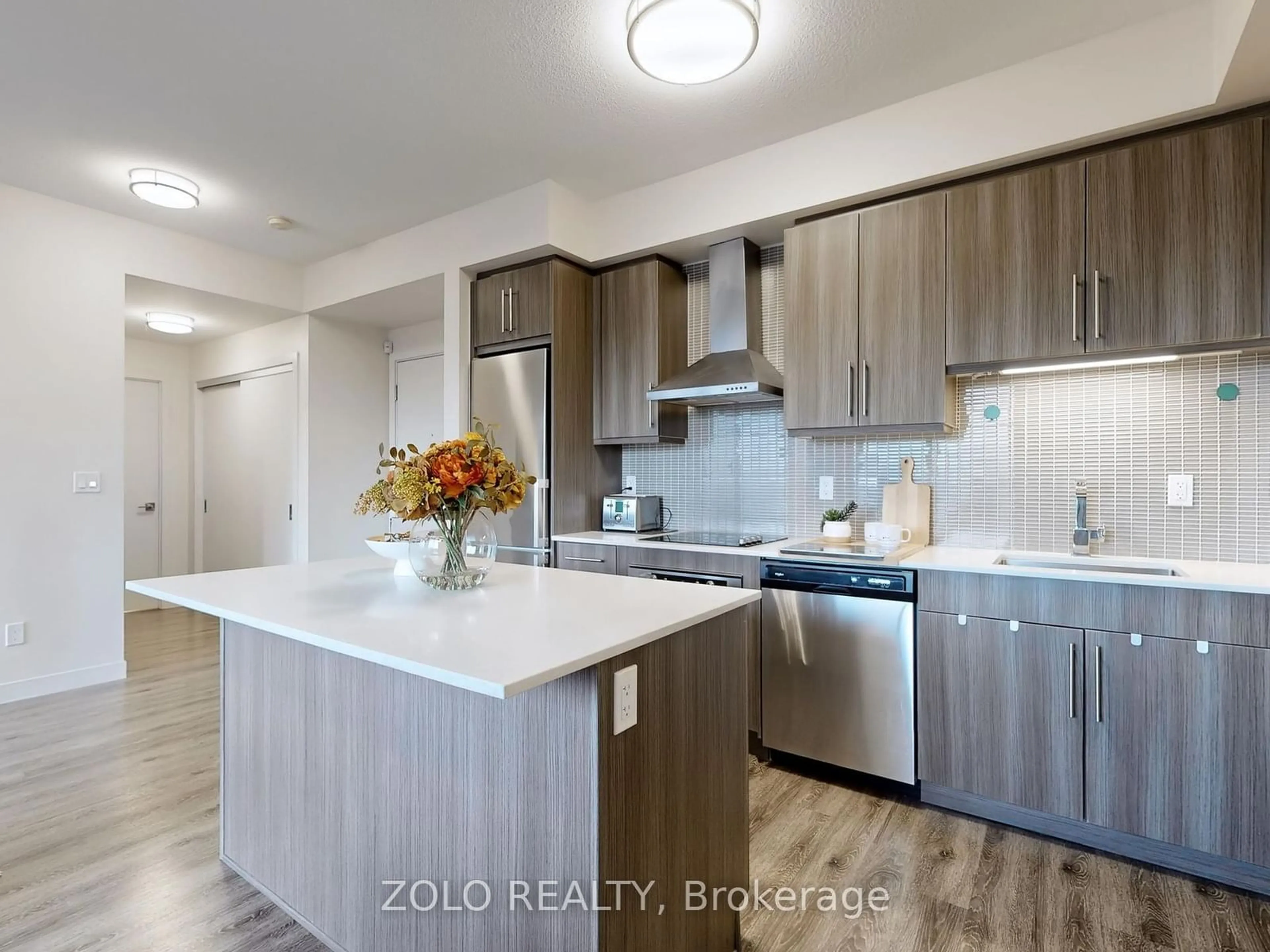 Kitchen with laundary machines for 2093 Fairview St #201, Burlington Ontario L7R 0B4