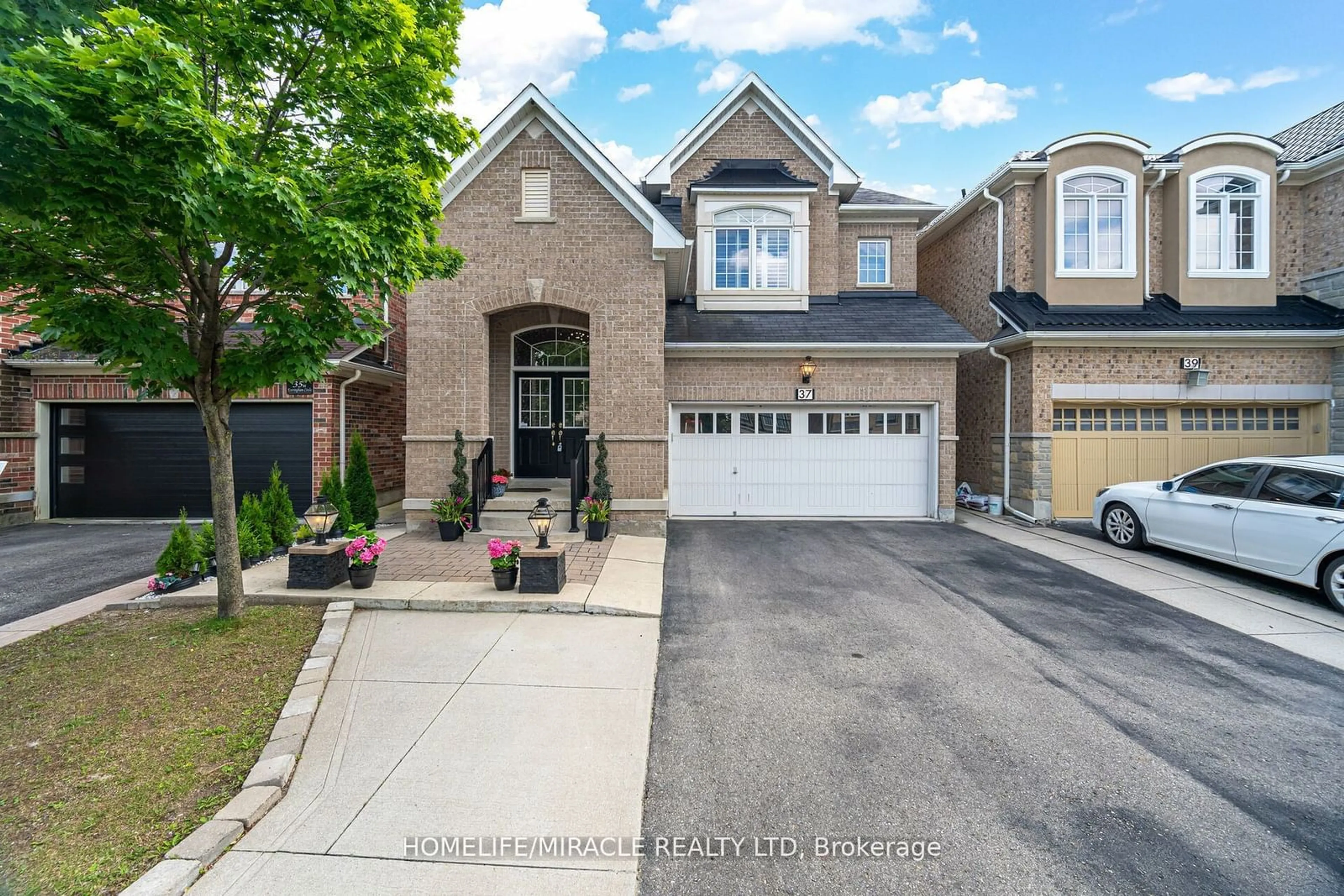 Home with brick exterior material for 37 Everingham Circ, Brampton Ontario L6R 0R7