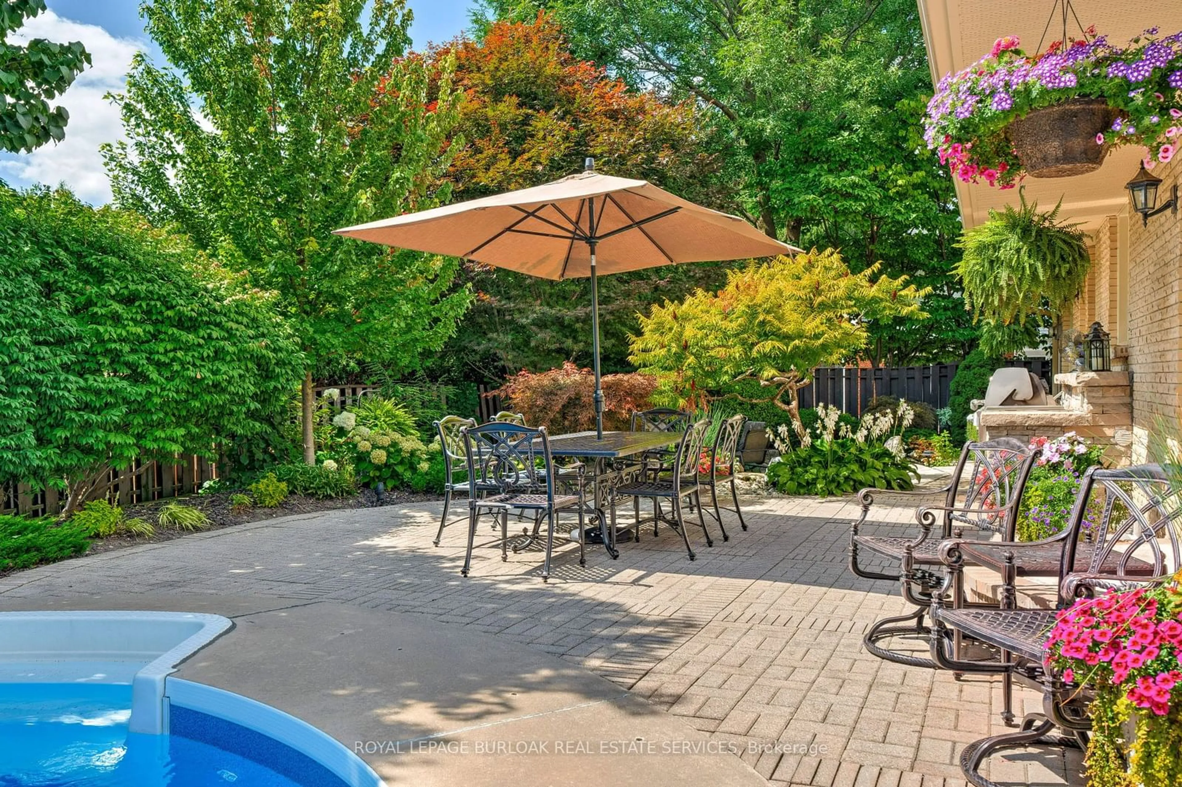 Patio, the fenced backyard for 306 Oakwood Crt, Burlington Ontario L7N 1W9