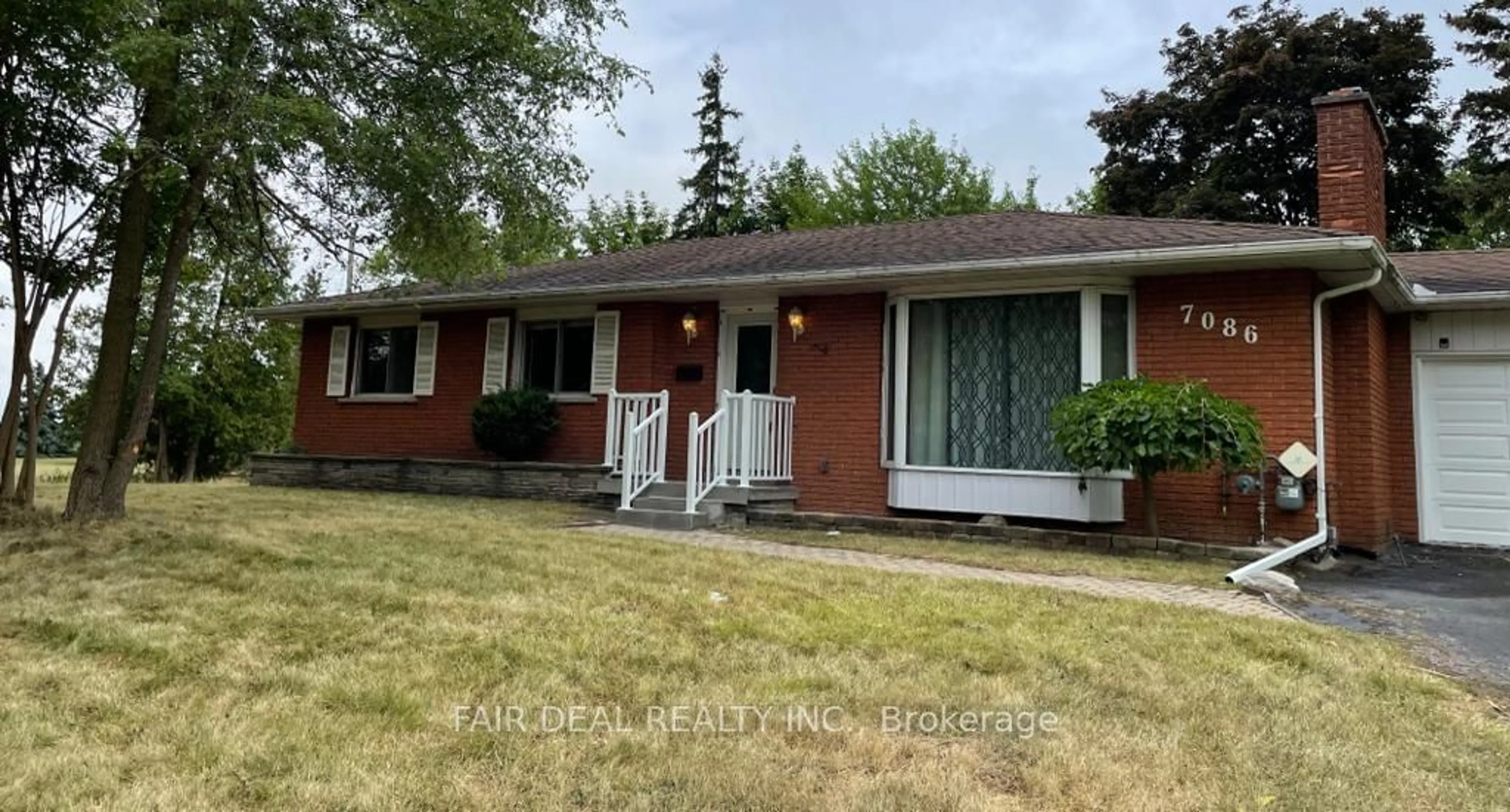 Frontside or backside of a home for 7086 Tremaine Rd, Milton Ontario L9T 2X5