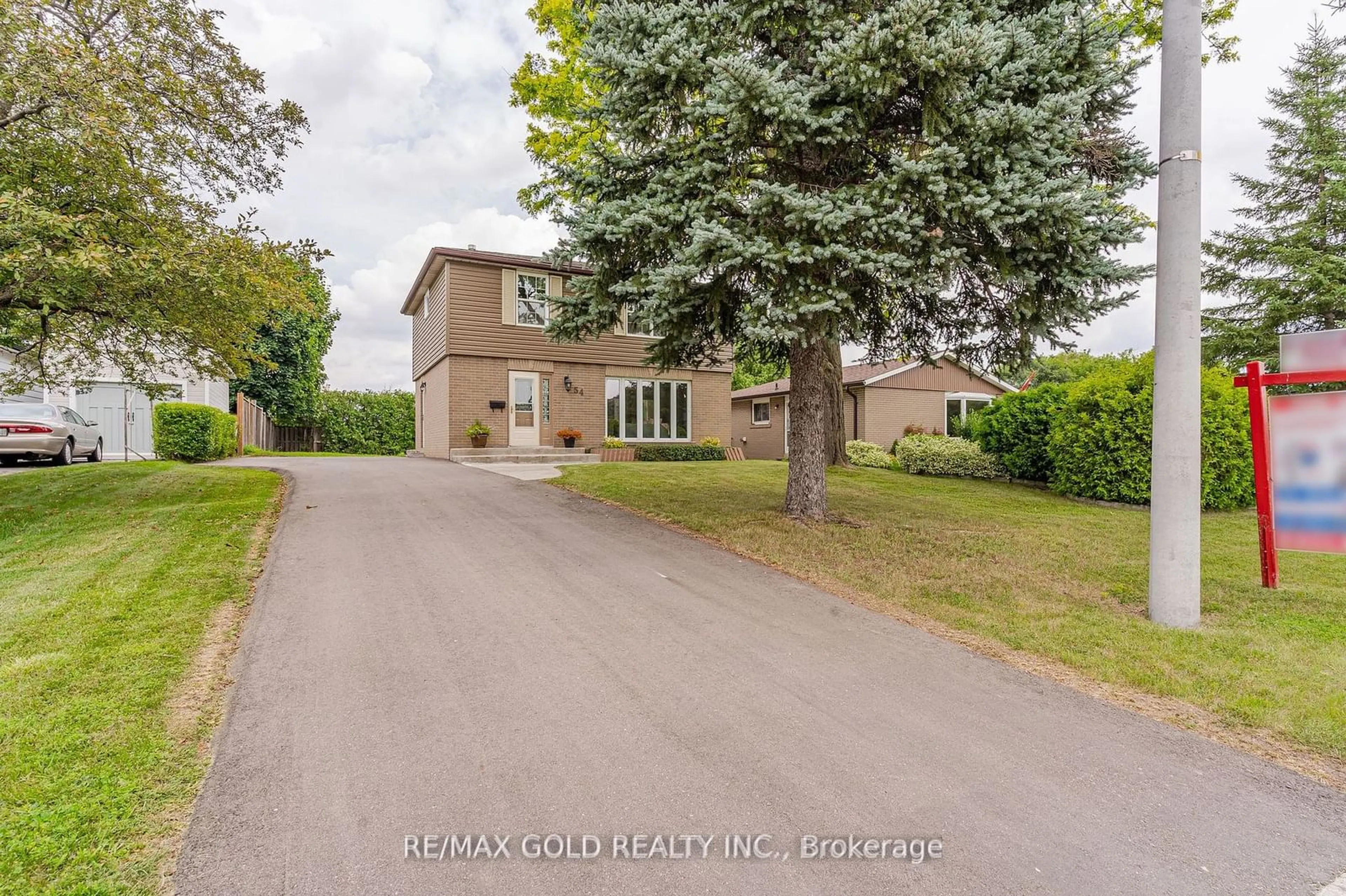 Frontside or backside of a home, the street view for 54 Dunblaine Cres, Brampton Ontario L6T 3H2