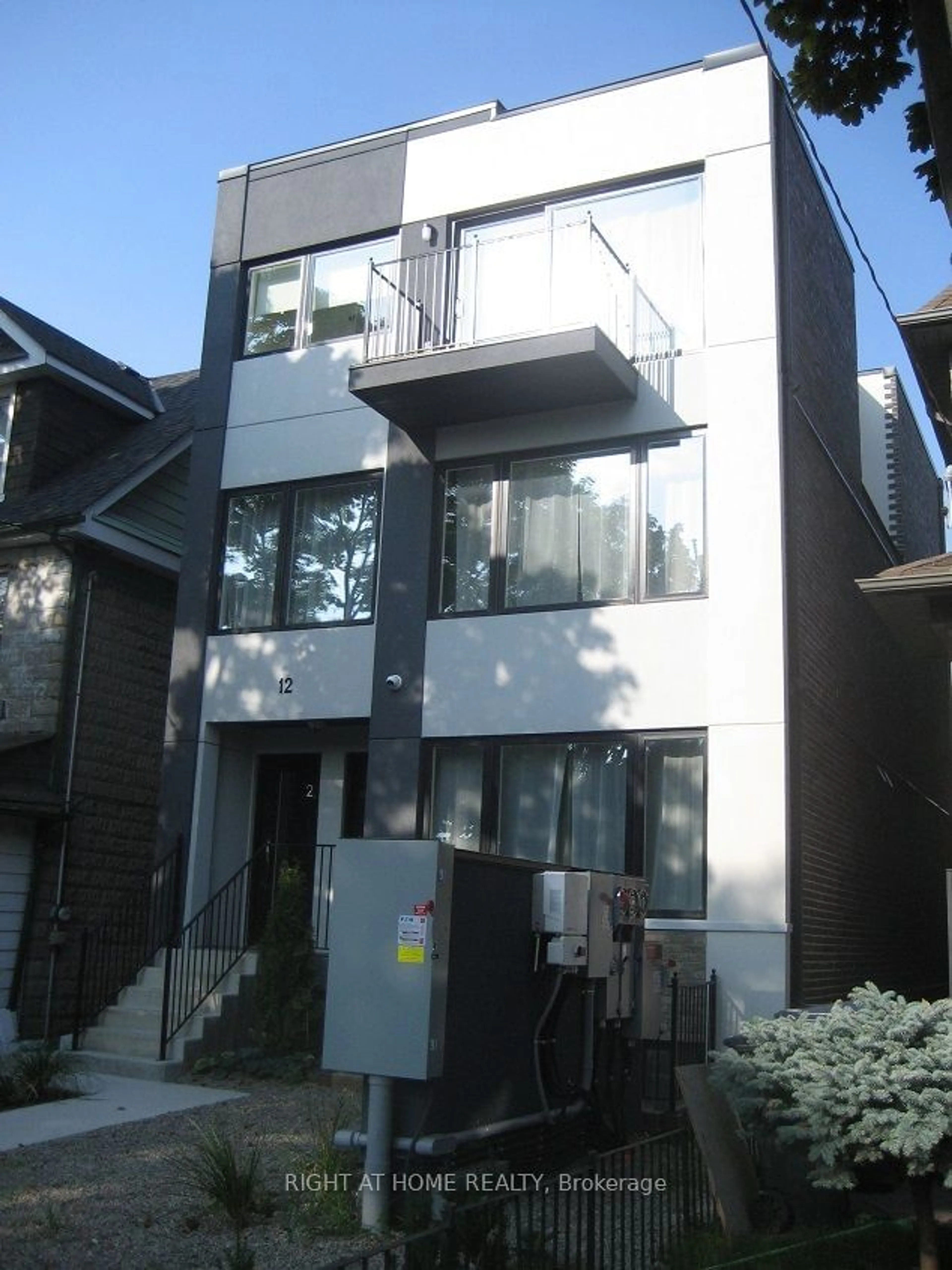 A pic from exterior of the house or condo, the front or back of building for 12 Batavia Ave, Toronto Ontario M6N 4A2