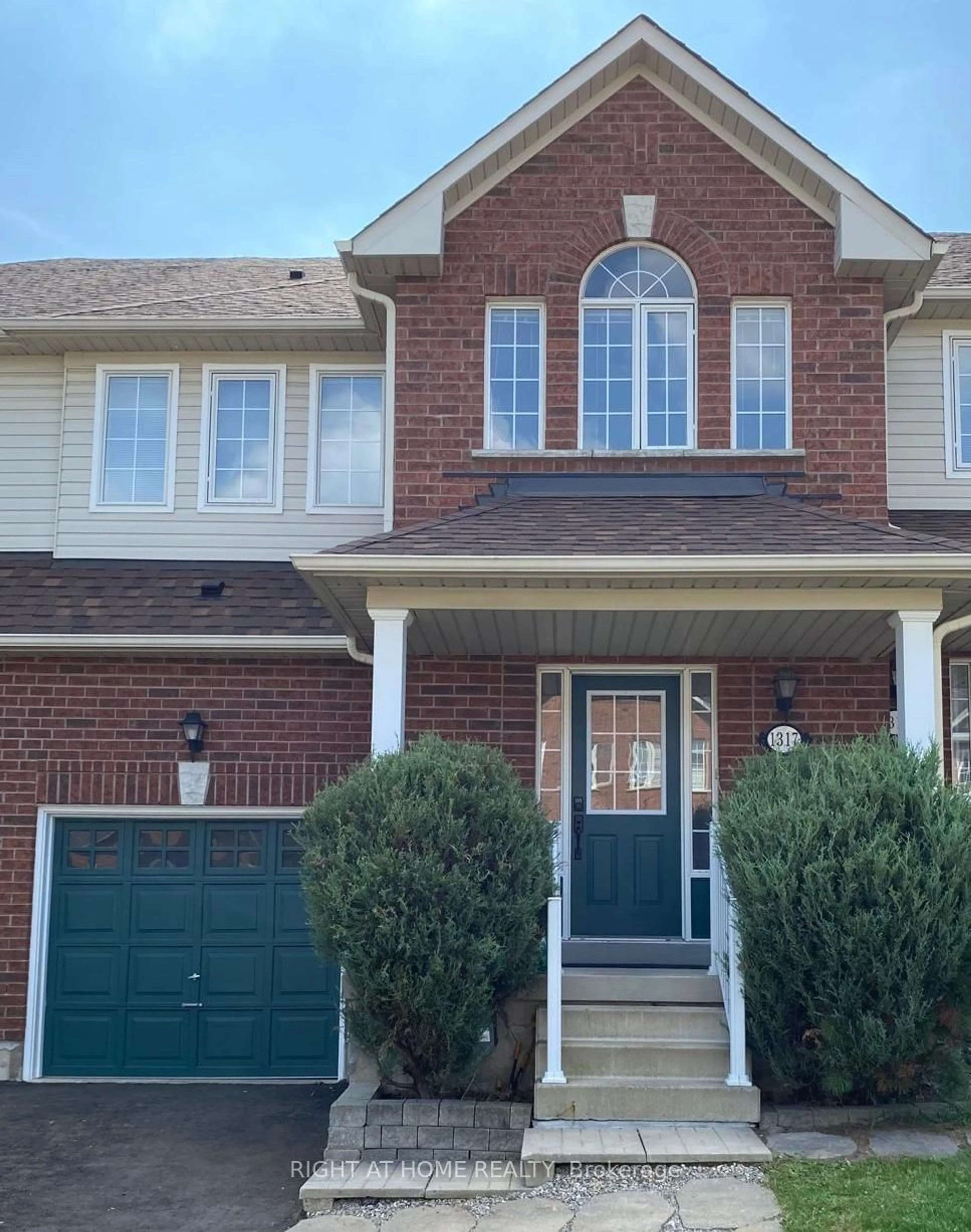 Home with brick exterior material for 1317 Cartmer Way, Milton Ontario L9T 6J9