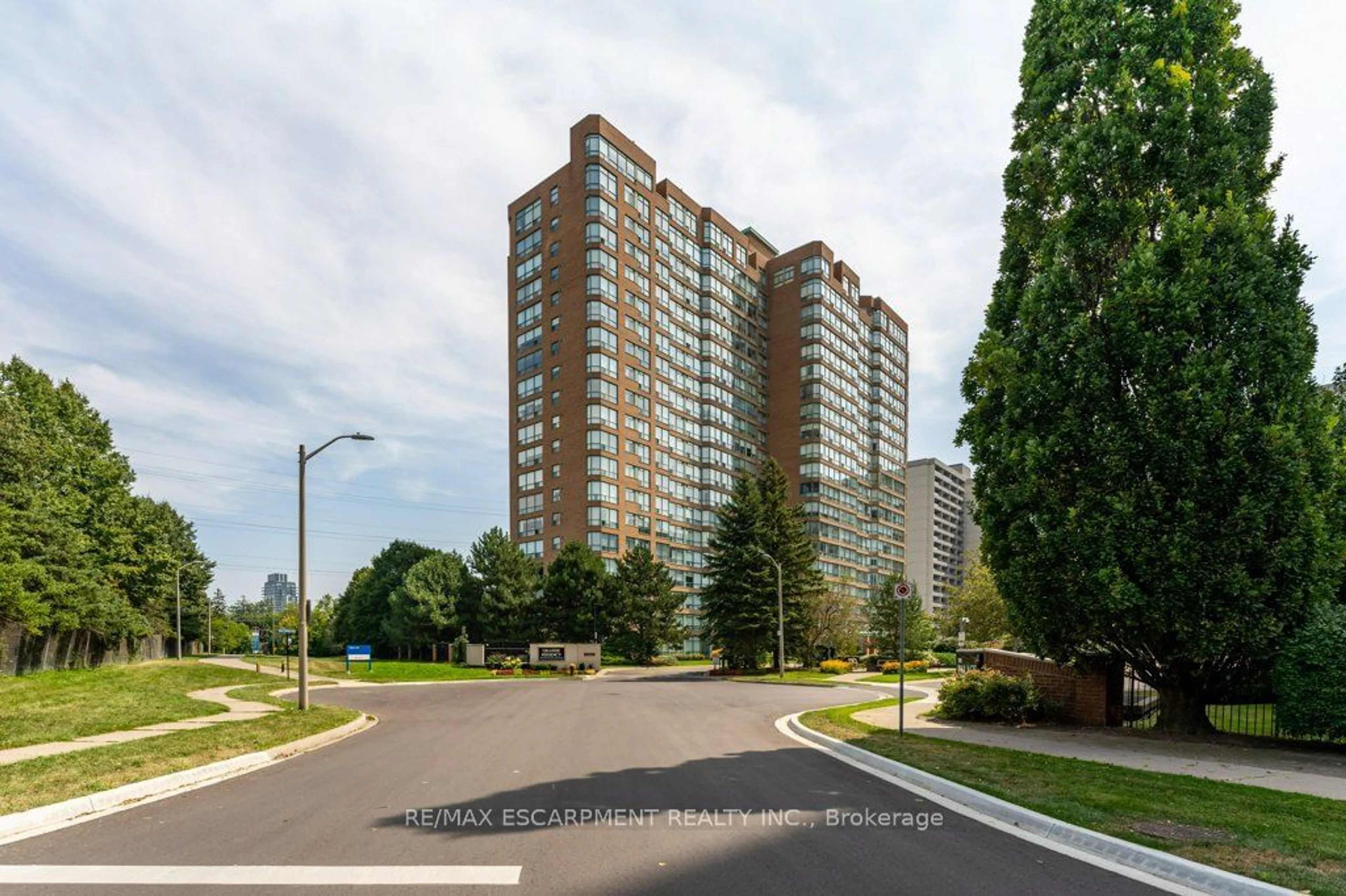 A pic from exterior of the house or condo, the street view for 1276 Maple Crossing Blvd #310, Burlington Ontario L7S 2J9